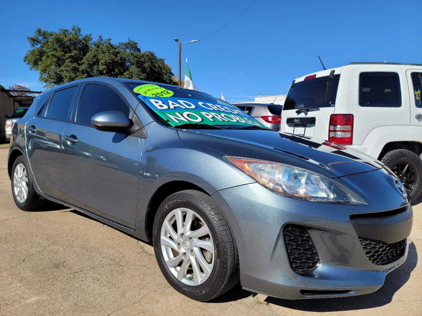 2012 GRAY /BLACK Mazda MAZDA3 I Touring 5-Door (JM1BL1L70C1) with an 2.0L L4 DOHC 16V engine, AUTO transmission, located at 2660 S.Garland Avenue, Garland, TX, 75041, (469) 298-3118, 32.885551, -96.655602 - Welcome to DallasAutos4Less, one of the Premier BUY HERE PAY HERE Dealers in the North Dallas Area. We specialize in financing to people with NO CREDIT or BAD CREDIT. We need proof of income, proof of residence, and a ID. Come buy your new car from us today!!rnrnThis is a very clean 2012 MAZDA MAZDA - Photo #1