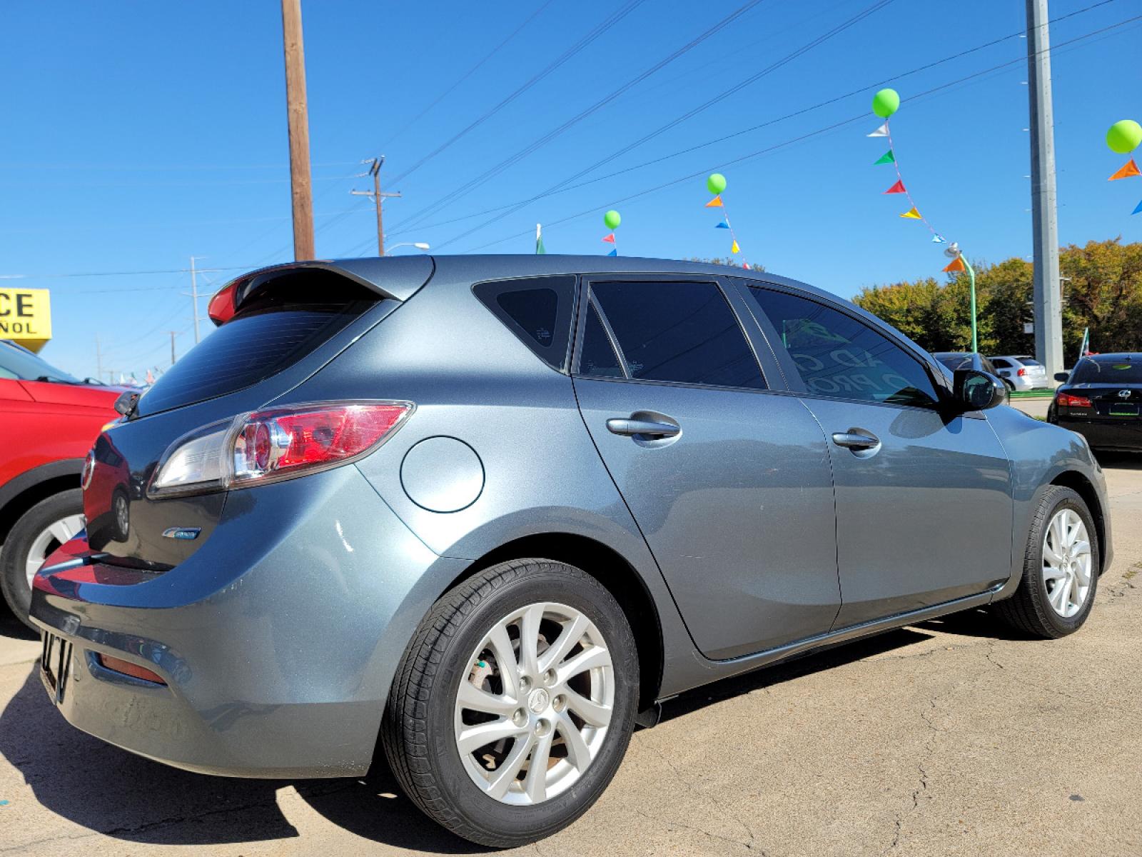 2012 GRAY /BLACK Mazda MAZDA3 I Touring 5-Door (JM1BL1L70C1) with an 2.0L L4 DOHC 16V engine, AUTO transmission, located at 2660 S.Garland Avenue, Garland, TX, 75041, (469) 298-3118, 32.885551, -96.655602 - Welcome to DallasAutos4Less, one of the Premier BUY HERE PAY HERE Dealers in the North Dallas Area. We specialize in financing to people with NO CREDIT or BAD CREDIT. We need proof of income, proof of residence, and a ID. Come buy your new car from us today!!rnrnThis is a very clean 2012 MAZDA MAZDA - Photo #3