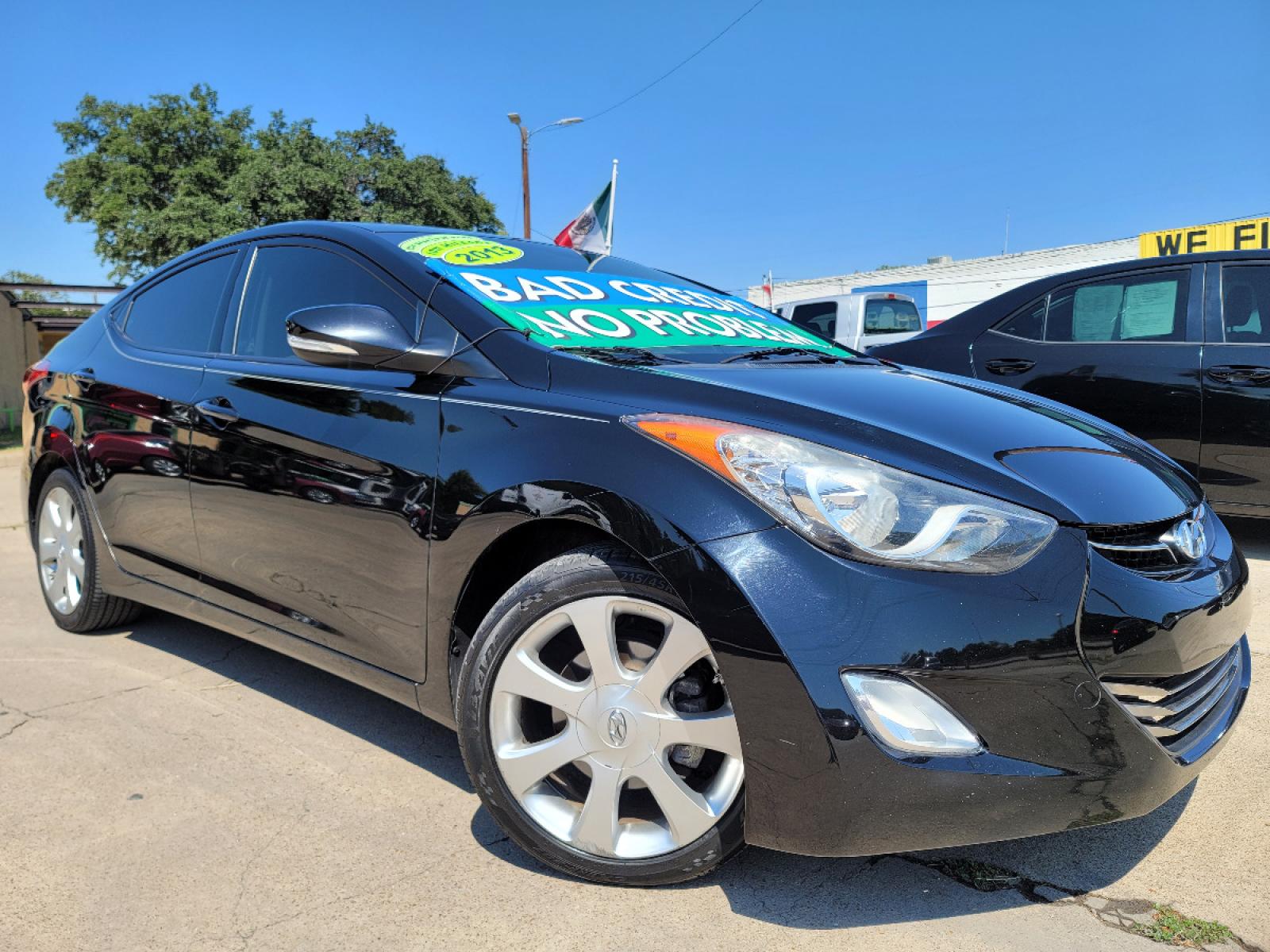 2013 BLACK /BEIGE Hyundai Elantra LIMITED (KMHDH4AE6DU) with an 1.8L L4 DOHC 16V engine, 6-Speed Automatic transmission, located at 2660 S.Garland Avenue, Garland, TX, 75041, (469) 298-3118, 32.885551, -96.655602 - Welcome to DallasAutos4Less, one of the Premier BUY HERE PAY HERE Dealers in the North Dallas Area. We specialize in financing to people with NO CREDIT or BAD CREDIT. We need proof of income, proof of residence, and a ID. Come buy your new car from us today!!rnrnThis is a very clean 2013 HYUNDAI ELA - Photo #0