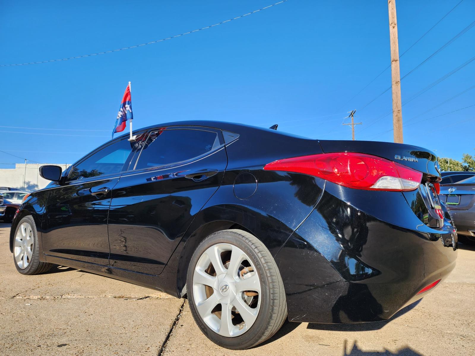 2013 BLACK /BEIGE Hyundai Elantra LIMITED (KMHDH4AE6DU) with an 1.8L L4 DOHC 16V engine, 6-Speed Automatic transmission, located at 2660 S.Garland Avenue, Garland, TX, 75041, (469) 298-3118, 32.885551, -96.655602 - Welcome to DallasAutos4Less, one of the Premier BUY HERE PAY HERE Dealers in the North Dallas Area. We specialize in financing to people with NO CREDIT or BAD CREDIT. We need proof of income, proof of residence, and a ID. Come buy your new car from us today!!rnrnThis is a very clean 2013 HYUNDAI ELA - Photo #6