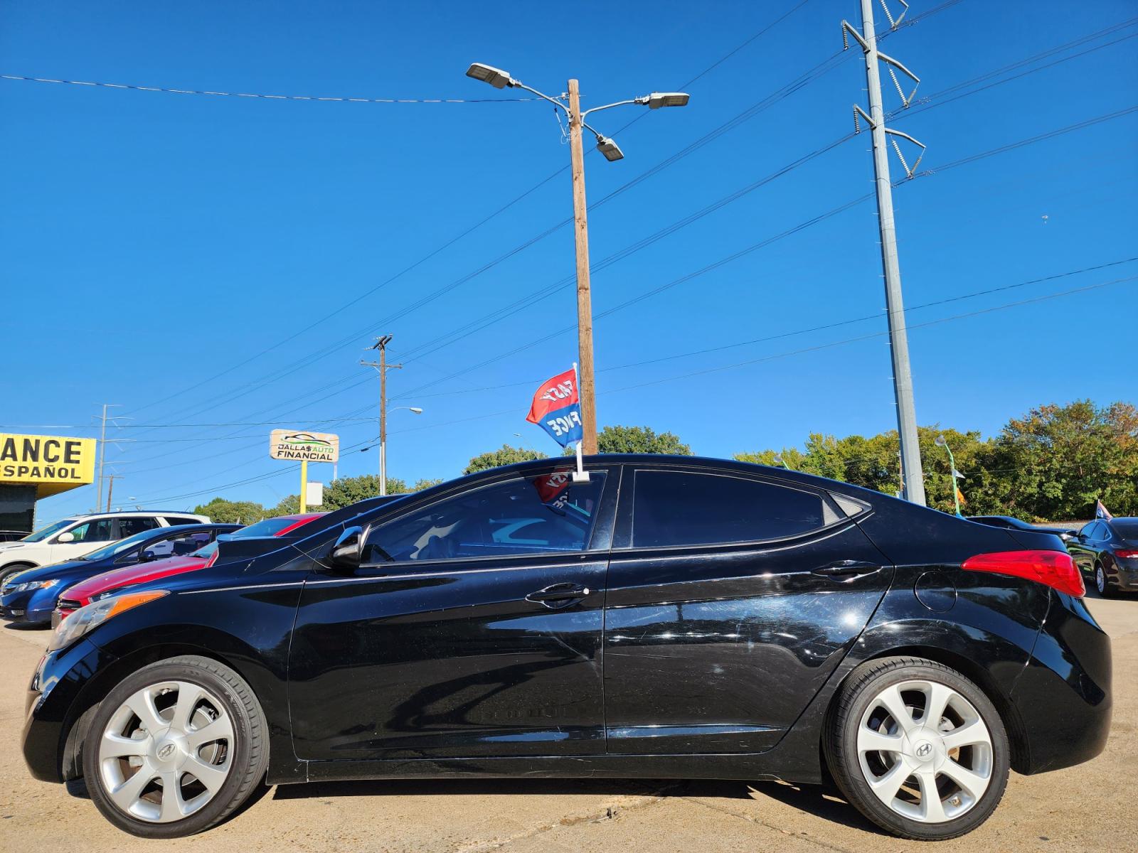 2013 BLACK /BEIGE Hyundai Elantra LIMITED (KMHDH4AE6DU) with an 1.8L L4 DOHC 16V engine, 6-Speed Automatic transmission, located at 2660 S.Garland Avenue, Garland, TX, 75041, (469) 298-3118, 32.885551, -96.655602 - Welcome to DallasAutos4Less, one of the Premier BUY HERE PAY HERE Dealers in the North Dallas Area. We specialize in financing to people with NO CREDIT or BAD CREDIT. We need proof of income, proof of residence, and a ID. Come buy your new car from us today!!rnrnThis is a very clean 2013 HYUNDAI ELA - Photo #7