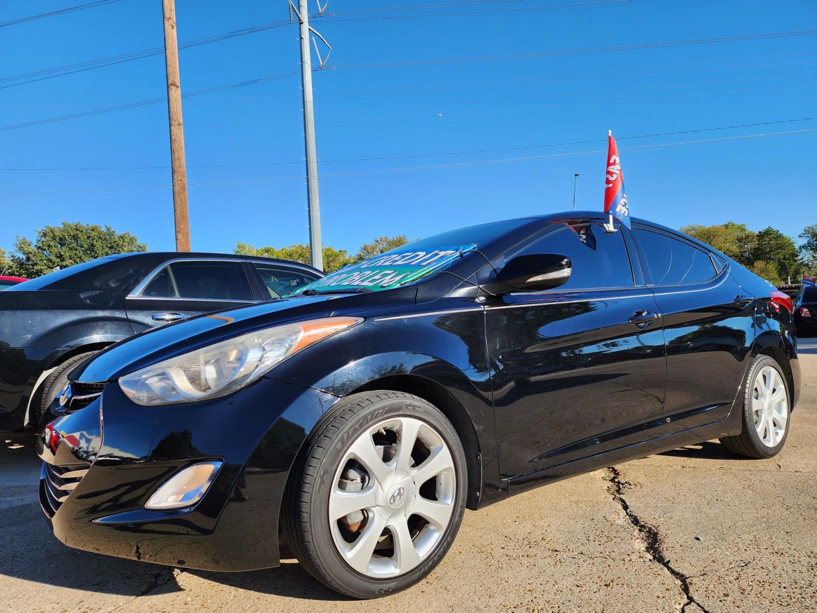 2013 BLACK /BEIGE Hyundai Elantra LIMITED (KMHDH4AE6DU) with an 1.8L L4 DOHC 16V engine, 6-Speed Automatic transmission, located at 2660 S.Garland Avenue, Garland, TX, 75041, (469) 298-3118, 32.885551, -96.655602 - Welcome to DallasAutos4Less, one of the Premier BUY HERE PAY HERE Dealers in the North Dallas Area. We specialize in financing to people with NO CREDIT or BAD CREDIT. We need proof of income, proof of residence, and a ID. Come buy your new car from us today!!rnrnThis is a very clean 2013 HYUNDAI ELA - Photo #8