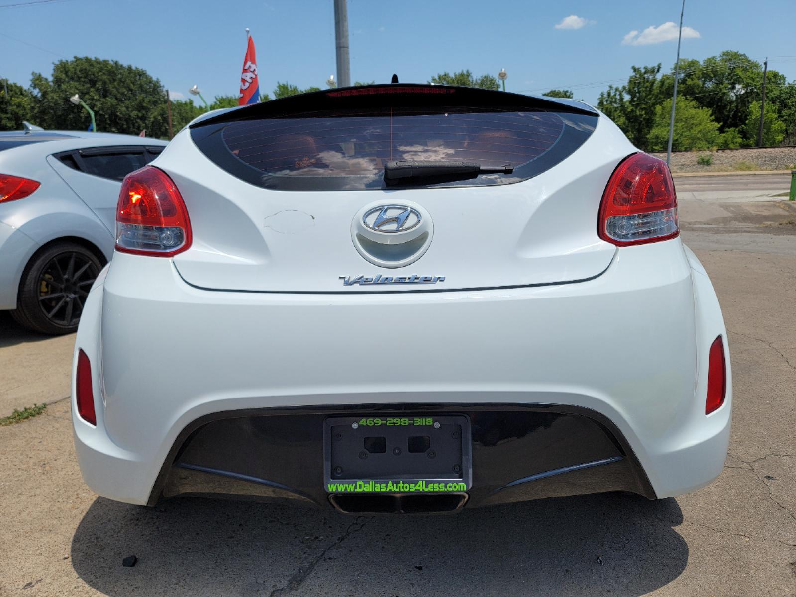 2013 WHITE /BLACK Hyundai Veloster (KMHTC6AD1DU) with an 1.6L L4 DOHC 16V engine, AUTO transmission, located at 2660 S.Garland Avenue, Garland, TX, 75041, (469) 298-3118, 32.885551, -96.655602 - Welcome to DallasAutos4Less, one of the Premier BUY HERE PAY HERE Dealers in the North Dallas Area. We specialize in financing to people with NO CREDIT or BAD CREDIT. We need proof of income, proof of residence, and a ID. Come buy your new car from us today!!rnrnThis is a very clean 2013 HYUNDAI VEL - Photo #5