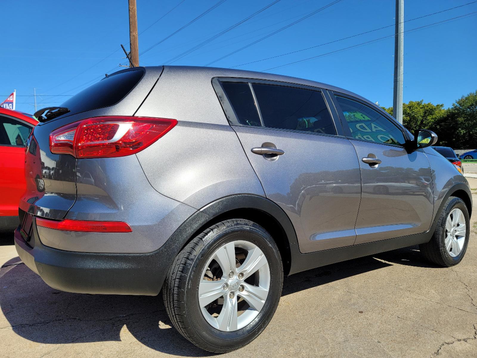 2013 GRAY /BLACK Kia Sportage LX (KNDPB3A28D7) with an 2.4L V6 DOHC 24V engine, 6-Speed Automatic transmission, located at 2660 S.Garland Avenue, Garland, TX, 75041, (469) 298-3118, 32.885551, -96.655602 - Welcome to DallasAutos4Less, one of the Premier BUY HERE PAY HERE Dealers in the North Dallas Area. We specialize in financing to people with NO CREDIT or BAD CREDIT. We need proof of income, proof of residence, and a ID. Come buy your new car from us today!!rnrnThis is a SUPER CLEAN 2013 KIA SPORTA - Photo #3