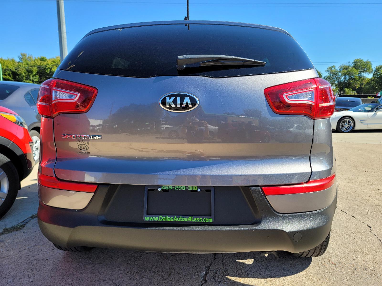 2013 GRAY /BLACK Kia Sportage LX (KNDPB3A28D7) with an 2.4L V6 DOHC 24V engine, 6-Speed Automatic transmission, located at 2660 S.Garland Avenue, Garland, TX, 75041, (469) 298-3118, 32.885551, -96.655602 - Welcome to DallasAutos4Less, one of the Premier BUY HERE PAY HERE Dealers in the North Dallas Area. We specialize in financing to people with NO CREDIT or BAD CREDIT. We need proof of income, proof of residence, and a ID. Come buy your new car from us today!!rnrnThis is a SUPER CLEAN 2013 KIA SPORTA - Photo #4