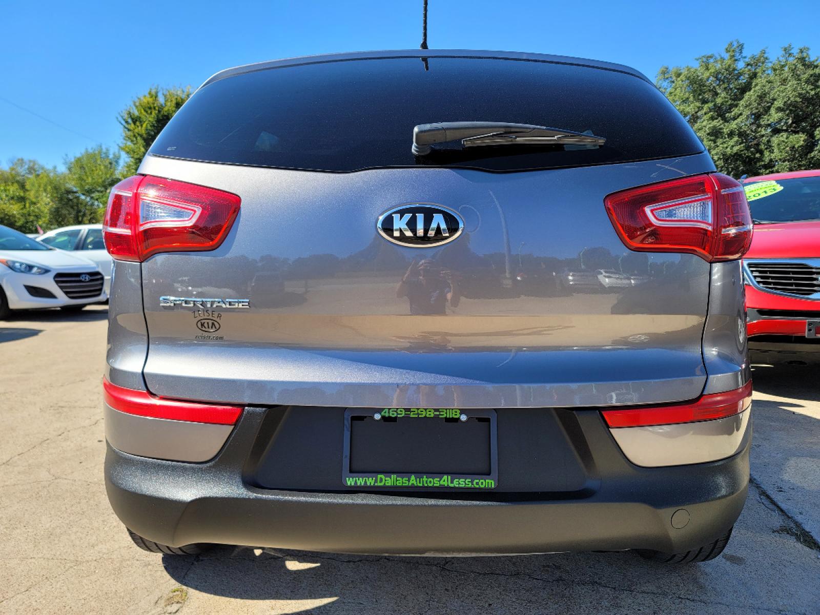 2013 GRAY /BLACK Kia Sportage LX (KNDPB3A28D7) with an 2.4L V6 DOHC 24V engine, 6-Speed Automatic transmission, located at 2660 S.Garland Avenue, Garland, TX, 75041, (469) 298-3118, 32.885551, -96.655602 - Welcome to DallasAutos4Less, one of the Premier BUY HERE PAY HERE Dealers in the North Dallas Area. We specialize in financing to people with NO CREDIT or BAD CREDIT. We need proof of income, proof of residence, and a ID. Come buy your new car from us today!!rnrnThis is a SUPER CLEAN 2013 KIA SPORTA - Photo #5