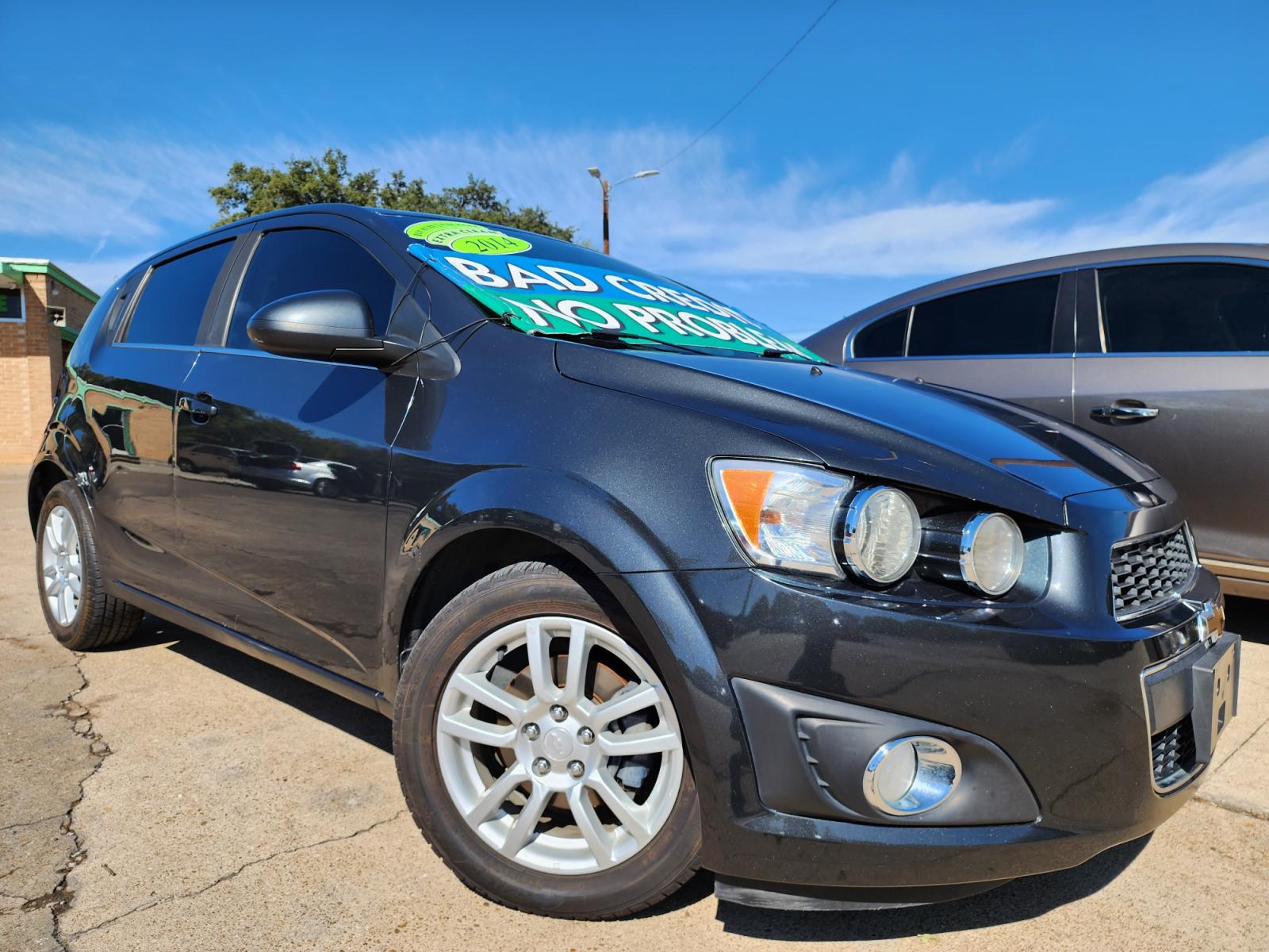 2014 GRAY Chevrolet Sonic LT (1G1JC6SH5E4) with an 1.8L L4 DOHC 24V engine, 6-Speed Automatic transmission, located at 2660 S.Garland Avenue, Garland, TX, 75041, (469) 298-3118, 32.885551, -96.655602 - Welcome to DallasAutos4Less, one of the Premier BUY HERE PAY HERE Dealers in the North Dallas Area. We specialize in financing to people with NO CREDIT or BAD CREDIT. We need proof of income, proof of residence, and a ID. Come buy your new car from us today!!rnrnThis is a very well cared for 2014 CH - Photo #0