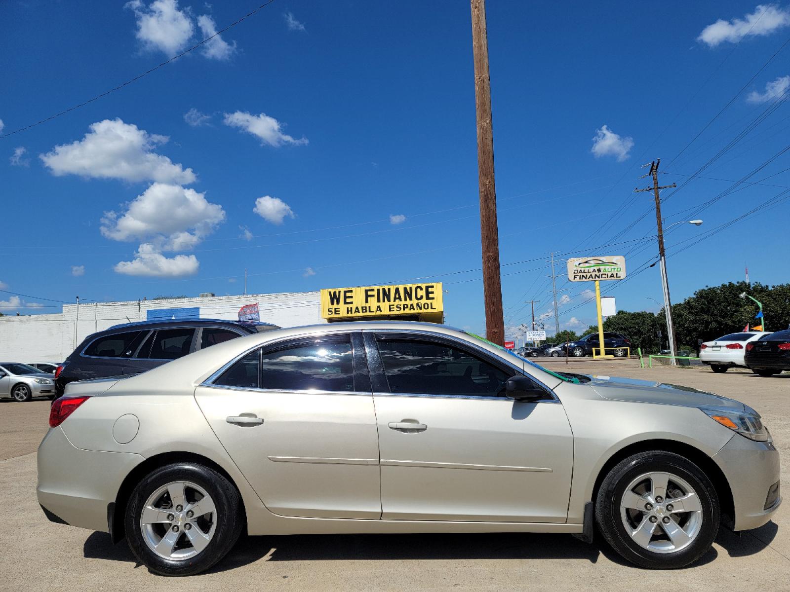2015 GOLD Chevrolet Malibu LS (1G11B5SL2FF) with an 2.5L L4 DOHC 16V engine, 6-Speed Automatic transmission, located at 2660 S.Garland Avenue, Garland, TX, 75041, (469) 298-3118, 32.885551, -96.655602 - Welcome to DallasAutos4Less, one of the Premier BUY HERE PAY HERE Dealers in the North Dallas Area. We specialize in financing to people with NO CREDIT or BAD CREDIT. We need proof of income, proof of residence, and a ID. Come buy your new car from us today!!rnrnThis is a very well cared for 2015 CH - Photo #2