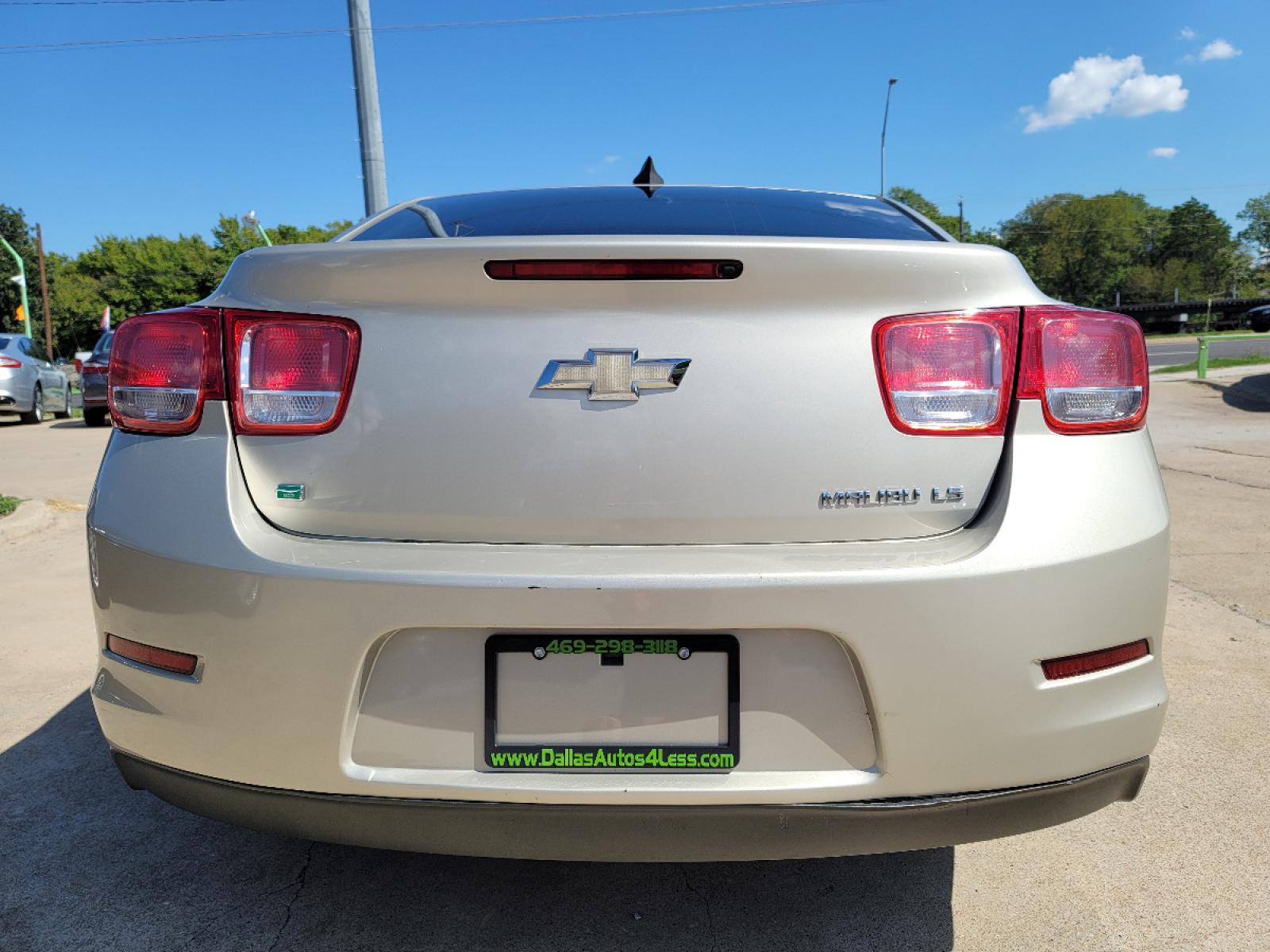 2015 GOLD Chevrolet Malibu LS (1G11B5SL2FF) with an 2.5L L4 DOHC 16V engine, 6-Speed Automatic transmission, located at 2660 S.Garland Avenue, Garland, TX, 75041, (469) 298-3118, 32.885551, -96.655602 - Welcome to DallasAutos4Less, one of the Premier BUY HERE PAY HERE Dealers in the North Dallas Area. We specialize in financing to people with NO CREDIT or BAD CREDIT. We need proof of income, proof of residence, and a ID. Come buy your new car from us today!!rnrnThis is a very well cared for 2015 CH - Photo #4