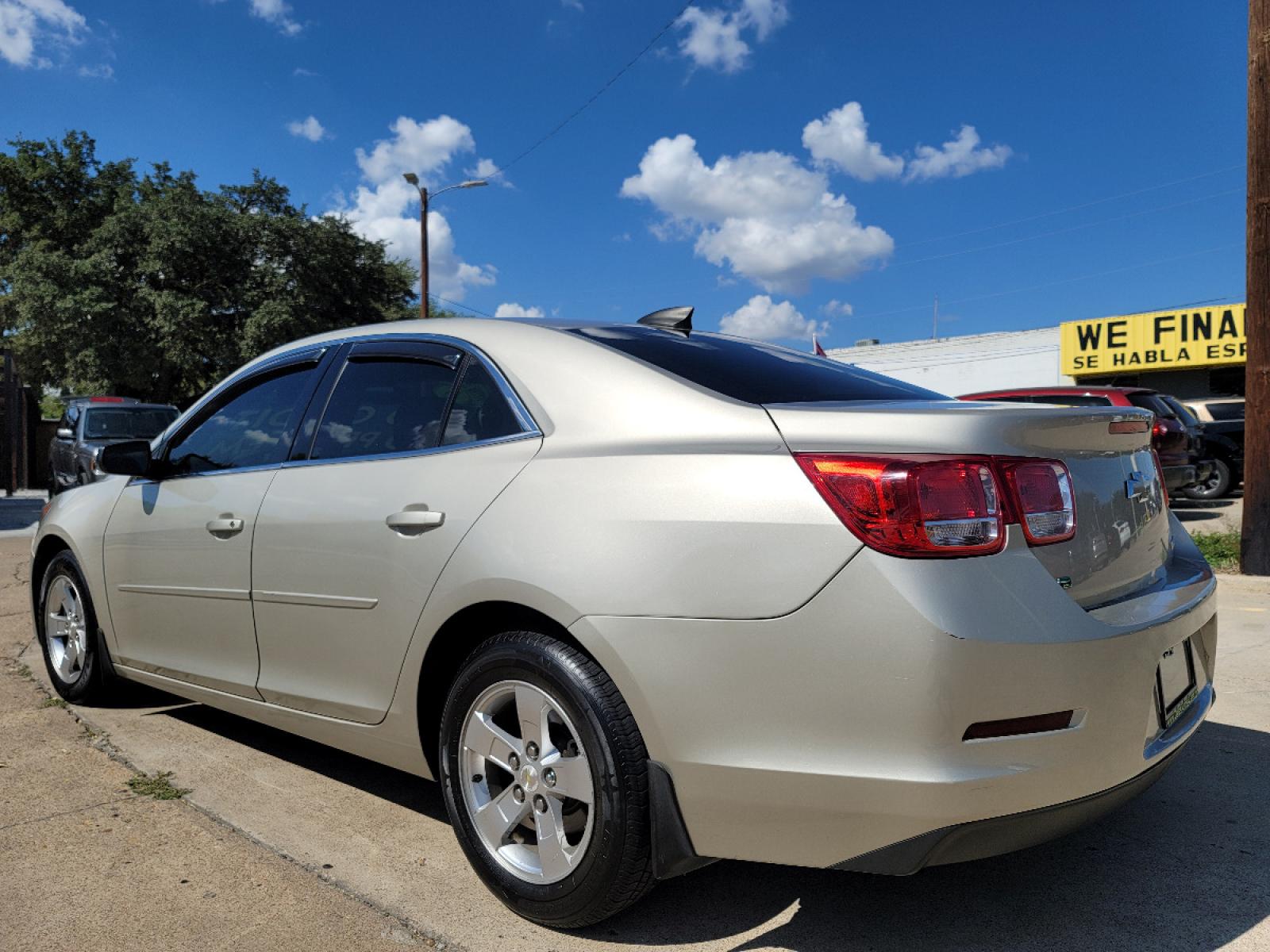 2015 GOLD Chevrolet Malibu LS (1G11B5SL2FF) with an 2.5L L4 DOHC 16V engine, 6-Speed Automatic transmission, located at 2660 S.Garland Avenue, Garland, TX, 75041, (469) 298-3118, 32.885551, -96.655602 - Welcome to DallasAutos4Less, one of the Premier BUY HERE PAY HERE Dealers in the North Dallas Area. We specialize in financing to people with NO CREDIT or BAD CREDIT. We need proof of income, proof of residence, and a ID. Come buy your new car from us today!!rnrnThis is a very well cared for 2015 CH - Photo #5