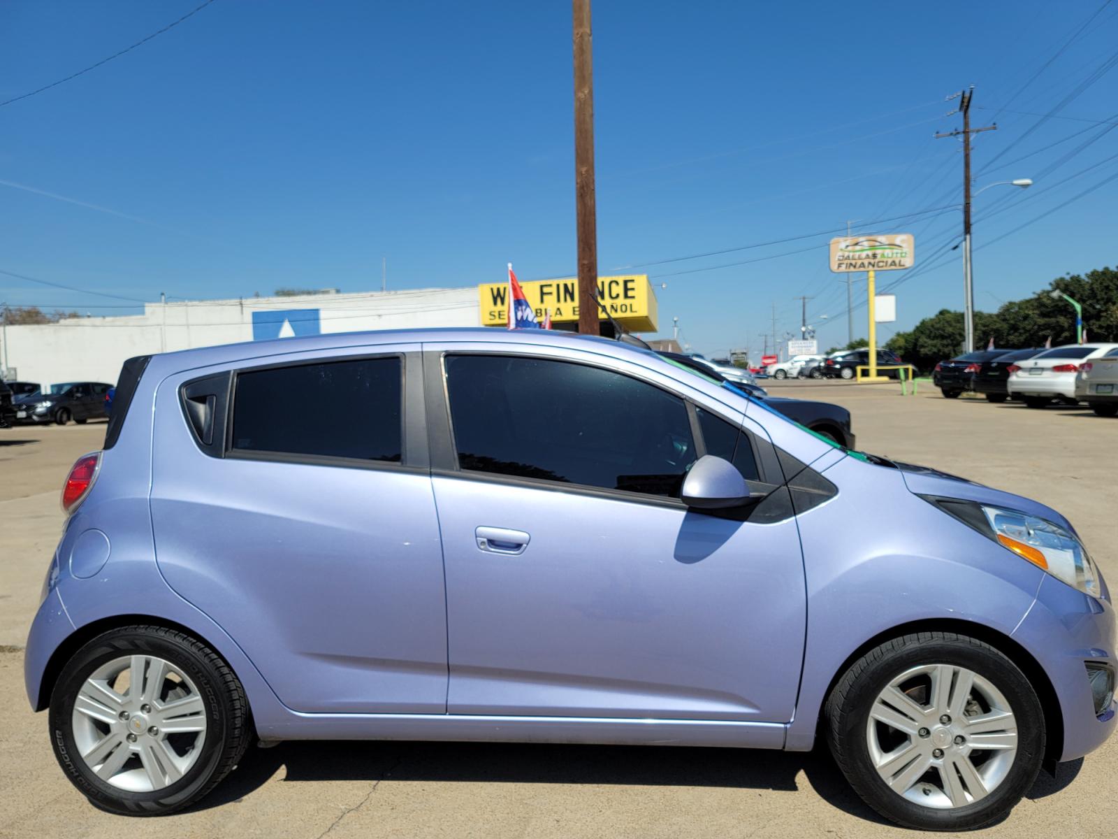 2015 BLUE /BLACK Chevrolet Spark LS (KL8CB6S93FC) with an 1.2L L4 16V DOHC engine, Continuously Variable Transmission transmission, located at 2660 S.Garland Avenue, Garland, TX, 75041, (469) 298-3118, 32.885551, -96.655602 - Welcome to DallasAutos4Less, one of the Premier BUY HERE PAY HERE Dealers in the North Dallas Area. We specialize in financing to people with NO CREDIT or BAD CREDIT. We need proof of income, proof of residence, and a ID. Come buy your new car from us today!!rnrnThis is a very well cared for 2015 CH - Photo #2