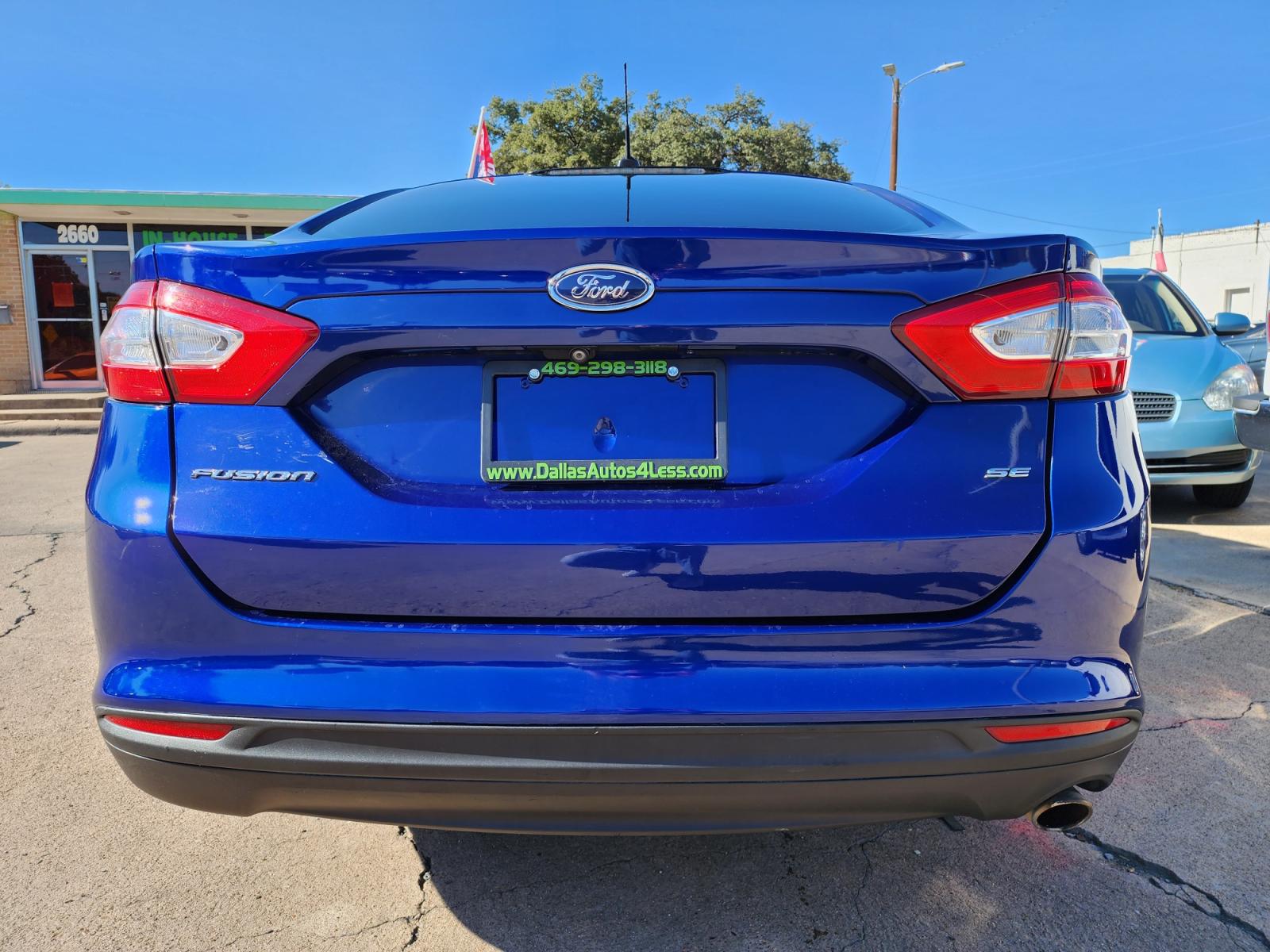 2015 BLUE /BLACK Ford Fusion S (3FA6P0G79FR) with an 2.5L L4 DOHC 16V engine, AUTO transmission, located at 2660 S.Garland Avenue, Garland, TX, 75041, (469) 298-3118, 32.885551, -96.655602 - Welcome to DallasAutos4Less, one of the Premier BUY HERE PAY HERE Dealers in the North Dallas Area. We specialize in financing to people with NO CREDIT or BAD CREDIT. We need proof of income, proof of residence, and a ID. Come buy your new car from us today!!rnrnThis is a Super Clean 2015 FORD FUSIO - Photo #5