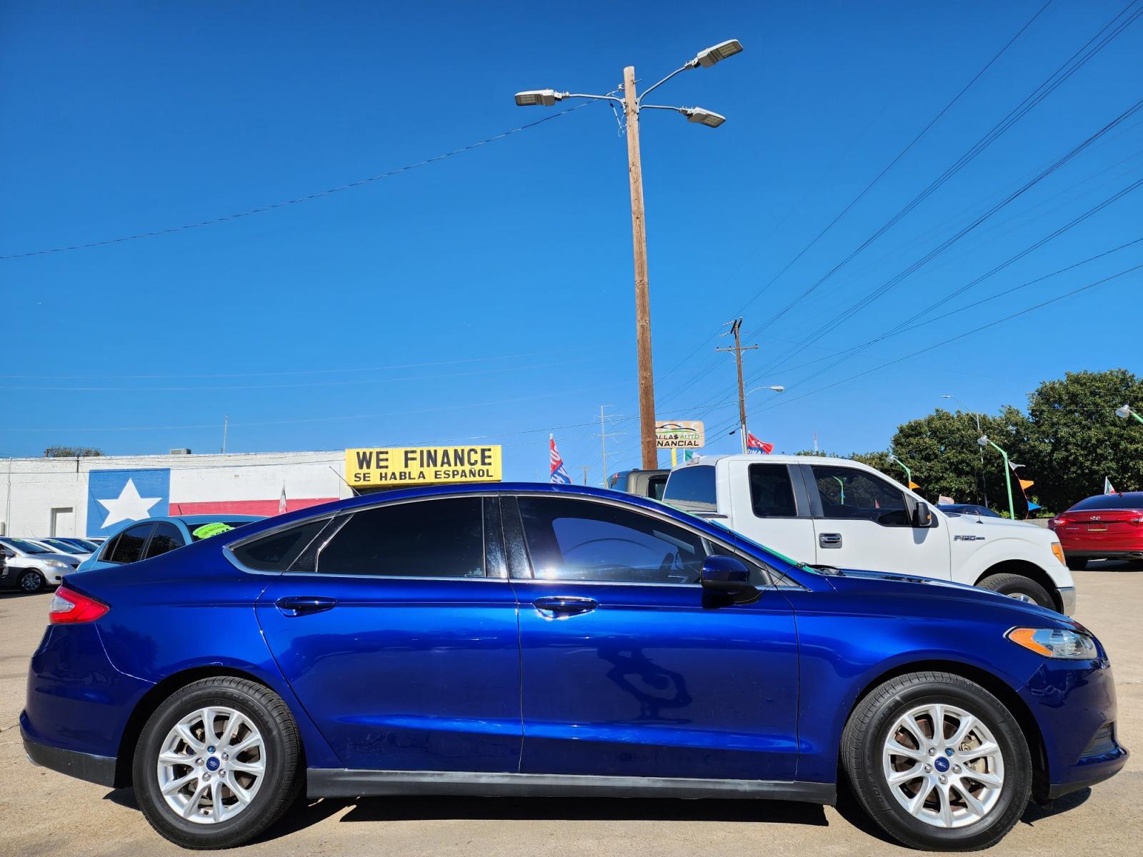 2015 BLUE /BLACK Ford Fusion S (3FA6P0G79FR) with an 2.5L L4 DOHC 16V engine, AUTO transmission, located at 2660 S.Garland Avenue, Garland, TX, 75041, (469) 298-3118, 32.885551, -96.655602 - Welcome to DallasAutos4Less, one of the Premier BUY HERE PAY HERE Dealers in the North Dallas Area. We specialize in financing to people with NO CREDIT or BAD CREDIT. We need proof of income, proof of residence, and a ID. Come buy your new car from us today!!rnrnThis is a Super Clean 2015 FORD FUSIO - Photo #2