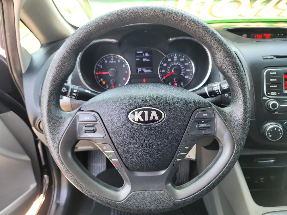 2015 BLACK /GRAY Kia Forte LX (KNAFK4A62F5) with an 1.8L L4 DOHC 16V engine, A transmission, located at 2660 S.Garland Avenue, Garland, TX, 75041, (469) 298-3118, 32.885551, -96.655602 - Welcome to DallasAutos4Less, one of the Premier BUY HERE PAY HERE Dealers in the North Dallas Area. We specialize in financing to people with NO CREDIT or BAD CREDIT. We need proof of income, proof of residence, and a ID. Come buy your new car from us today!!rnrnThis is a SUPER CLEAN 2015 KIA FORTE - Photo #12