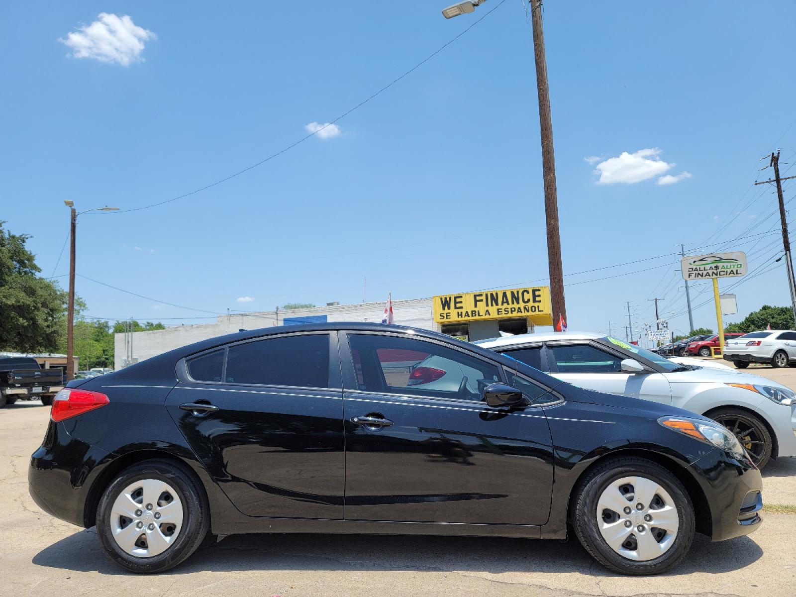 2015 BLACK /GRAY Kia Forte LX (KNAFK4A62F5) with an 1.8L L4 DOHC 16V engine, A transmission, located at 2660 S.Garland Avenue, Garland, TX, 75041, (469) 298-3118, 32.885551, -96.655602 - Welcome to DallasAutos4Less, one of the Premier BUY HERE PAY HERE Dealers in the North Dallas Area. We specialize in financing to people with NO CREDIT or BAD CREDIT. We need proof of income, proof of residence, and a ID. Come buy your new car from us today!!rnrnThis is a SUPER CLEAN 2015 KIA FORTE - Photo #2
