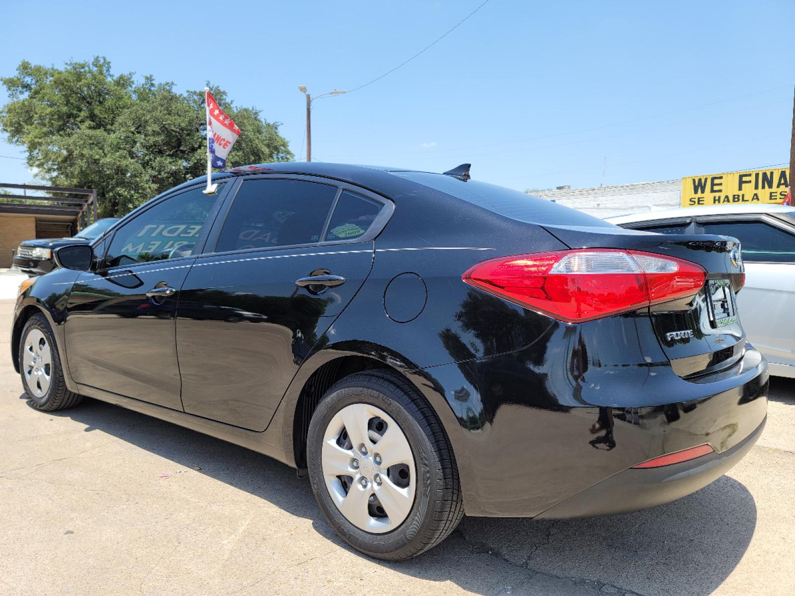 2015 BLACK /GRAY Kia Forte LX (KNAFK4A62F5) with an 1.8L L4 DOHC 16V engine, A transmission, located at 2660 S.Garland Avenue, Garland, TX, 75041, (469) 298-3118, 32.885551, -96.655602 - Welcome to DallasAutos4Less, one of the Premier BUY HERE PAY HERE Dealers in the North Dallas Area. We specialize in financing to people with NO CREDIT or BAD CREDIT. We need proof of income, proof of residence, and a ID. Come buy your new car from us today!!rnrnThis is a SUPER CLEAN 2015 KIA FORTE - Photo #5