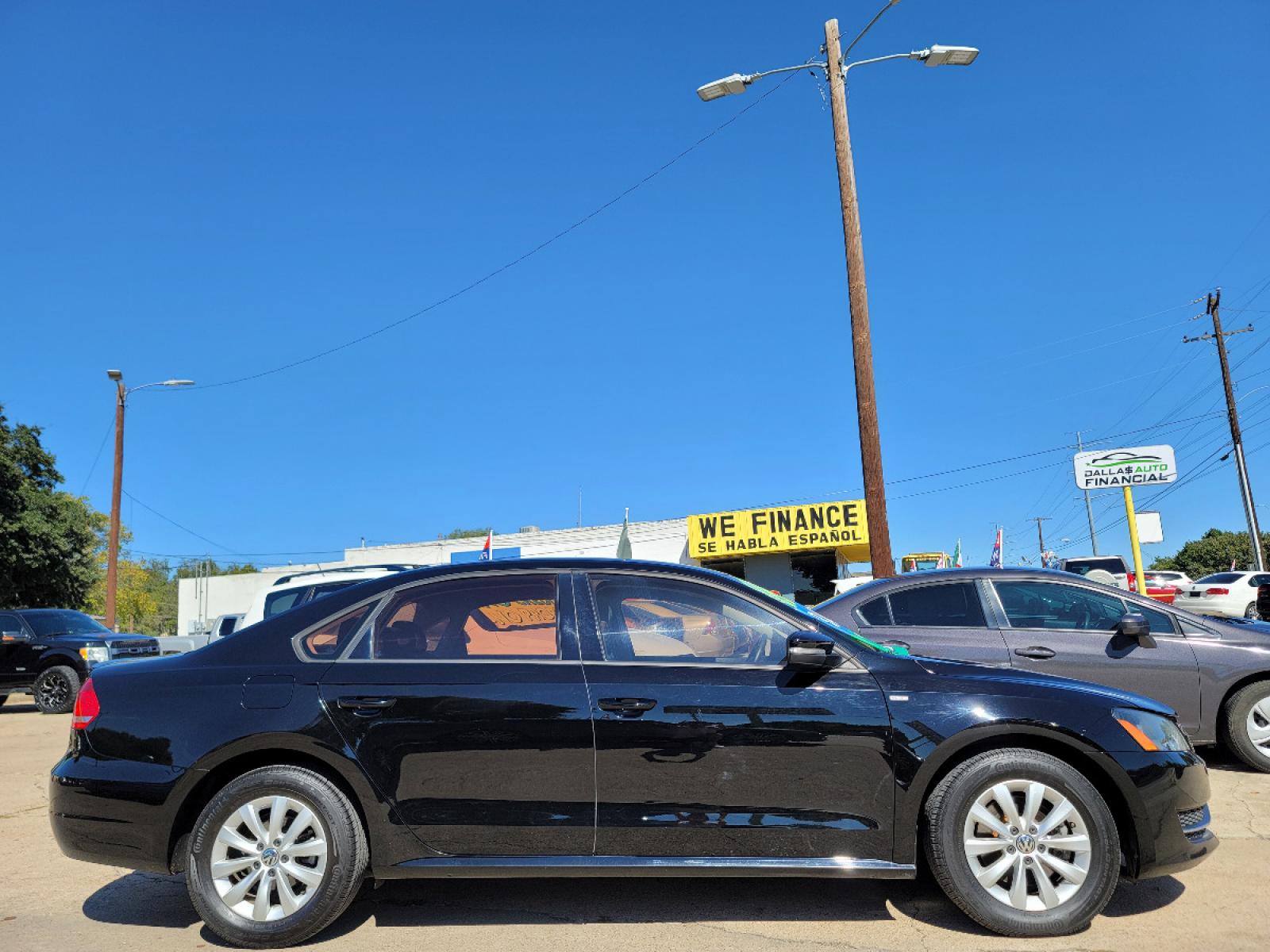 2015 BLACK /BLACK Volkswagen Passat S Wolfsburg Ed. (1VWAS7A32FC) with an 1.8L L4 TURBO DIESEL engine, 6-Speed Automatic transmission, located at 2660 S.Garland Avenue, Garland, TX, 75041, (469) 298-3118, 32.885551, -96.655602 - Welcome to DallasAutos4Less, one of the Premier BUY HERE PAY HERE Dealers in the North Dallas Area. We specialize in financing to people with NO CREDIT or BAD CREDIT. We need proof of income, proof of residence, and a ID. Come buy your new car from us today!!rnrnThis is a SUPER CLEAN 2015 VOLKSWAGEN - Photo #2
