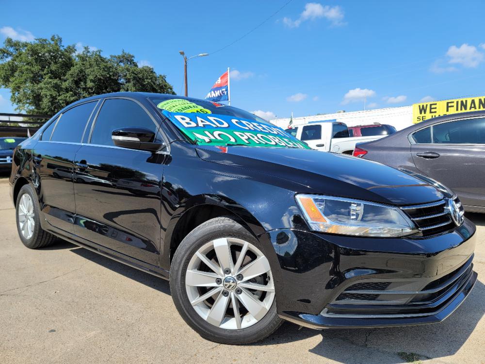 2016 BLACK /BEIGE LEATHER Volkswagen Jetta SE (3VWD67AJXGM) with an 1.4L L4 DOHC 20V engine, 6A transmission, located at 2660 S.Garland Avenue, Garland, TX, 75041, (469) 298-3118, 32.885551, -96.655602 - Welcome to DallasAutos4Less, one of the Premier BUY HERE PAY HERE Dealers in the North Dallas Area. We specialize in financing to people with NO CREDIT or BAD CREDIT. We need proof of income, proof of residence, and a ID. Come buy your new car from us today!!rnrnThis is a SUPER CLEAN 2016 VOLKSWAGEN - Photo #0