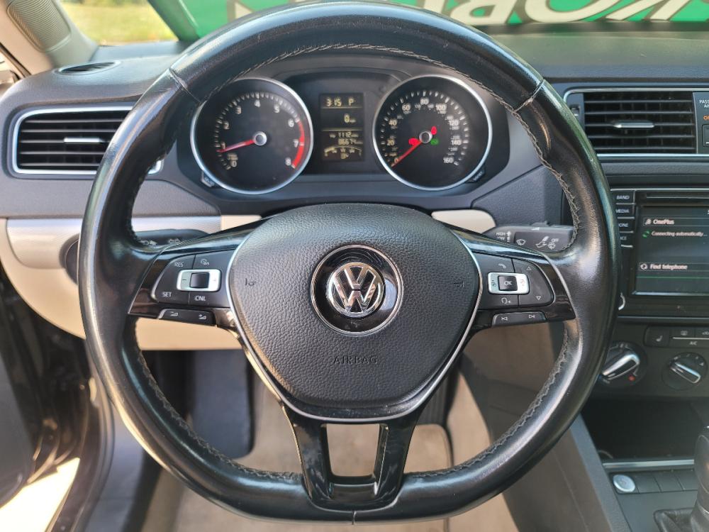 2016 BLACK /BEIGE LEATHER Volkswagen Jetta SE (3VWD67AJXGM) with an 1.4L L4 DOHC 20V engine, 6A transmission, located at 2660 S.Garland Avenue, Garland, TX, 75041, (469) 298-3118, 32.885551, -96.655602 - Welcome to DallasAutos4Less, one of the Premier BUY HERE PAY HERE Dealers in the North Dallas Area. We specialize in financing to people with NO CREDIT or BAD CREDIT. We need proof of income, proof of residence, and a ID. Come buy your new car from us today!!rnrnThis is a SUPER CLEAN 2016 VOLKSWAGEN - Photo #13