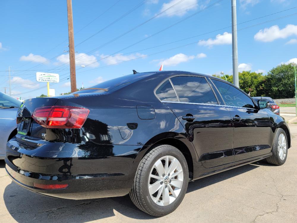 2016 BLACK /BEIGE LEATHER Volkswagen Jetta SE (3VWD67AJXGM) with an 1.4L L4 DOHC 20V engine, 6A transmission, located at 2660 S.Garland Avenue, Garland, TX, 75041, (469) 298-3118, 32.885551, -96.655602 - Welcome to DallasAutos4Less, one of the Premier BUY HERE PAY HERE Dealers in the North Dallas Area. We specialize in financing to people with NO CREDIT or BAD CREDIT. We need proof of income, proof of residence, and a ID. Come buy your new car from us today!!rnrnThis is a SUPER CLEAN 2016 VOLKSWAGEN - Photo #3