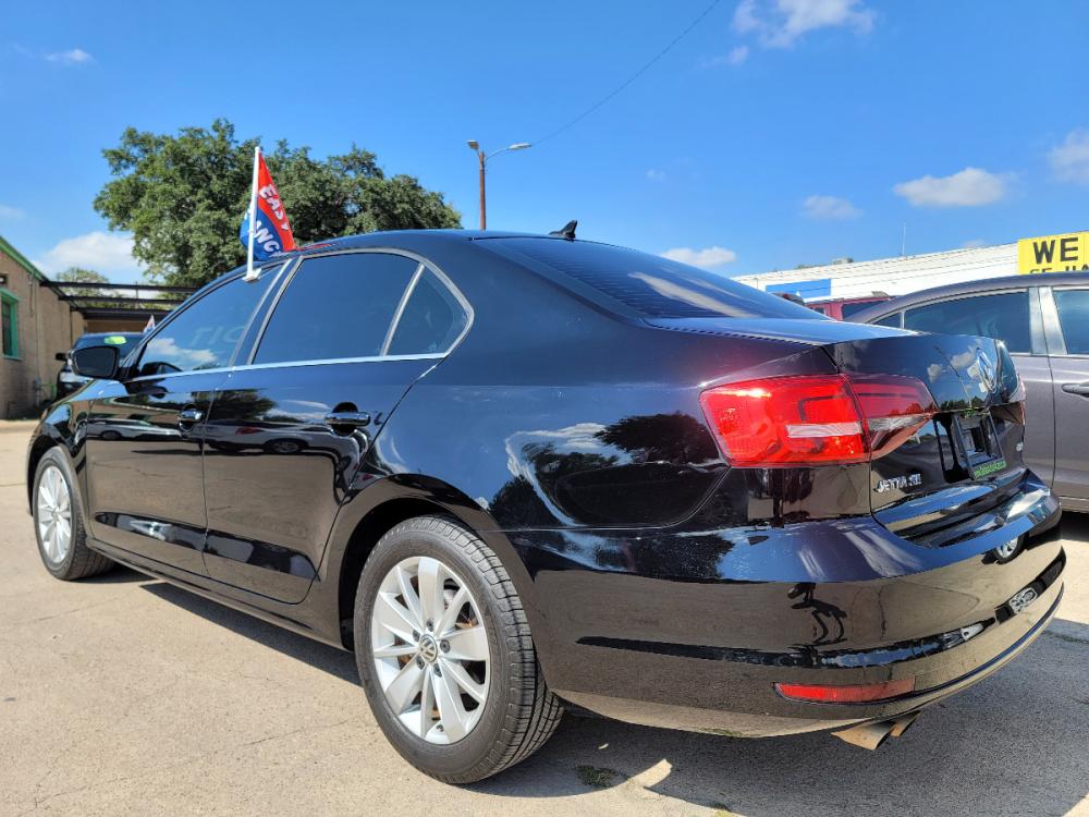 2016 BLACK /BEIGE LEATHER Volkswagen Jetta SE (3VWD67AJXGM) with an 1.4L L4 DOHC 20V engine, 6A transmission, located at 2660 S.Garland Avenue, Garland, TX, 75041, (469) 298-3118, 32.885551, -96.655602 - Welcome to DallasAutos4Less, one of the Premier BUY HERE PAY HERE Dealers in the North Dallas Area. We specialize in financing to people with NO CREDIT or BAD CREDIT. We need proof of income, proof of residence, and a ID. Come buy your new car from us today!!rnrnThis is a SUPER CLEAN 2016 VOLKSWAGEN - Photo #5