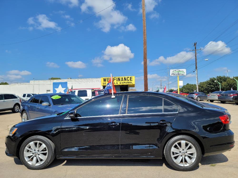 2016 BLACK /BEIGE LEATHER Volkswagen Jetta SE (3VWD67AJXGM) with an 1.4L L4 DOHC 20V engine, 6A transmission, located at 2660 S.Garland Avenue, Garland, TX, 75041, (469) 298-3118, 32.885551, -96.655602 - Welcome to DallasAutos4Less, one of the Premier BUY HERE PAY HERE Dealers in the North Dallas Area. We specialize in financing to people with NO CREDIT or BAD CREDIT. We need proof of income, proof of residence, and a ID. Come buy your new car from us today!!rnrnThis is a SUPER CLEAN 2016 VOLKSWAGEN - Photo #6