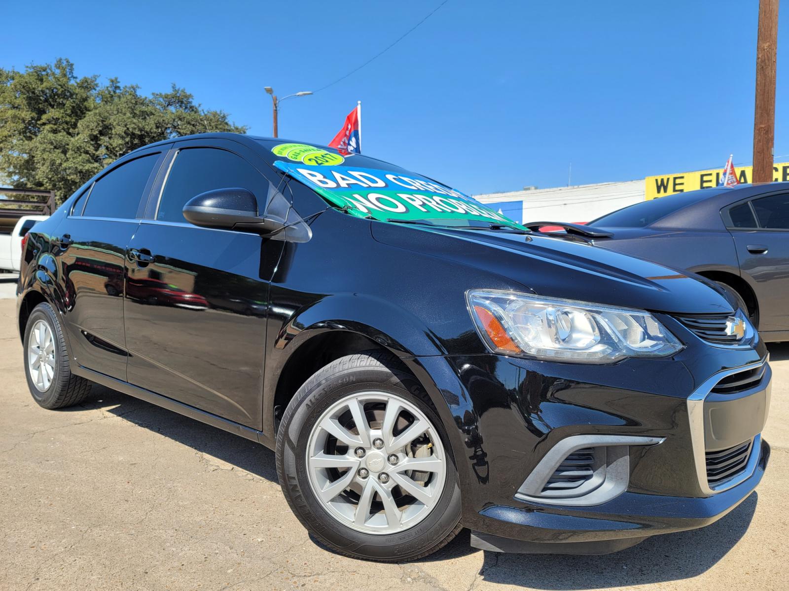 2017 BLACK Chevrolet Sonic LT (1G1JD5SH6H4) with an 1.8L L4 DOHC 24V engine, AUTO transmission, located at 2660 S.Garland Avenue, Garland, TX, 75041, (469) 298-3118, 32.885551, -96.655602 - Welcome to DallasAutos4Less, one of the Premier BUY HERE PAY HERE Dealers in the North Dallas Area. We specialize in financing to people with NO CREDIT or BAD CREDIT. We need proof of income, proof of residence, and a ID. Come buy your new car from us today!!rnrnThis is a very well cared for 2017 CH - Photo #0