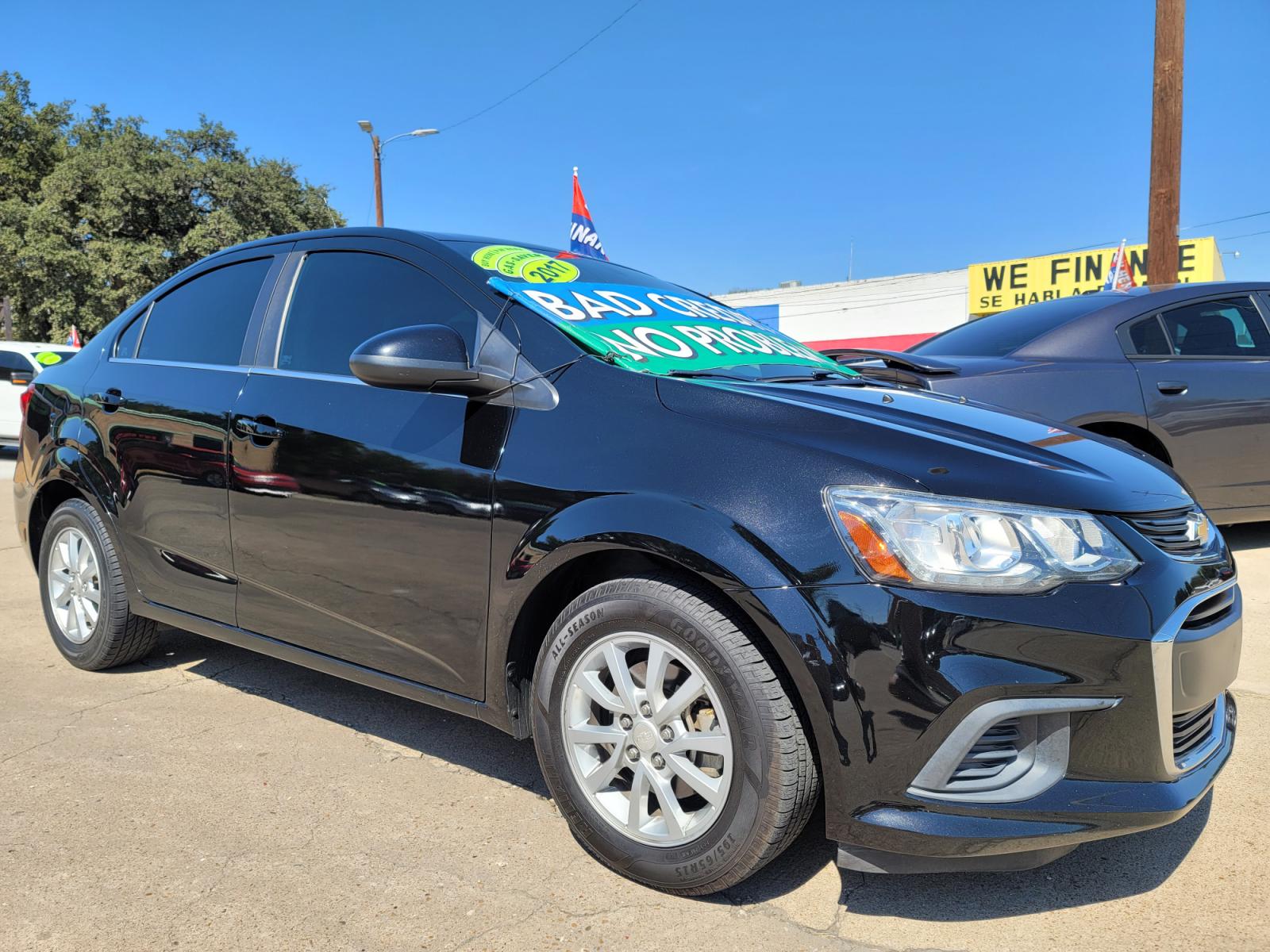 2017 BLACK Chevrolet Sonic LT (1G1JD5SH6H4) with an 1.8L L4 DOHC 24V engine, AUTO transmission, located at 2660 S.Garland Avenue, Garland, TX, 75041, (469) 298-3118, 32.885551, -96.655602 - Welcome to DallasAutos4Less, one of the Premier BUY HERE PAY HERE Dealers in the North Dallas Area. We specialize in financing to people with NO CREDIT or BAD CREDIT. We need proof of income, proof of residence, and a ID. Come buy your new car from us today!!rnrnThis is a very well cared for 2017 CH - Photo #1
