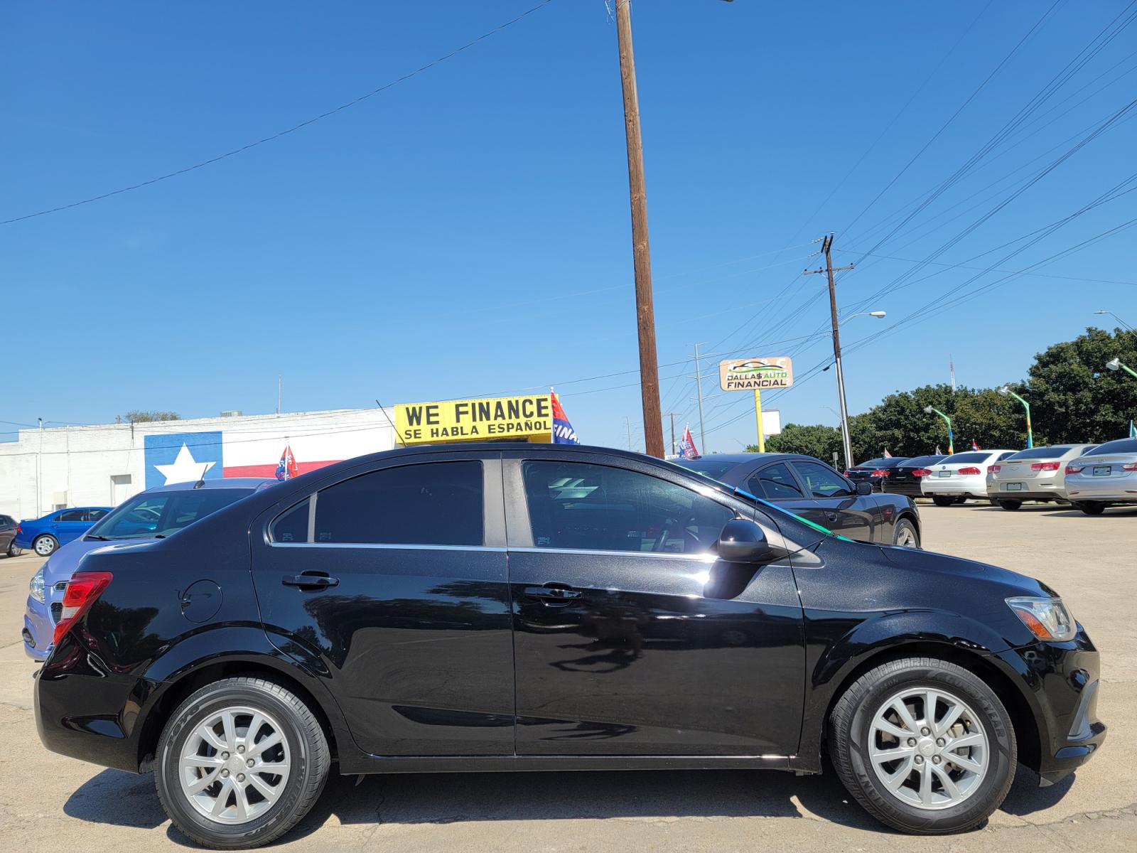 2017 BLACK Chevrolet Sonic LT (1G1JD5SH6H4) with an 1.8L L4 DOHC 24V engine, AUTO transmission, located at 2660 S.Garland Avenue, Garland, TX, 75041, (469) 298-3118, 32.885551, -96.655602 - Welcome to DallasAutos4Less, one of the Premier BUY HERE PAY HERE Dealers in the North Dallas Area. We specialize in financing to people with NO CREDIT or BAD CREDIT. We need proof of income, proof of residence, and a ID. Come buy your new car from us today!!rnrnThis is a very well cared for 2017 CH - Photo #2