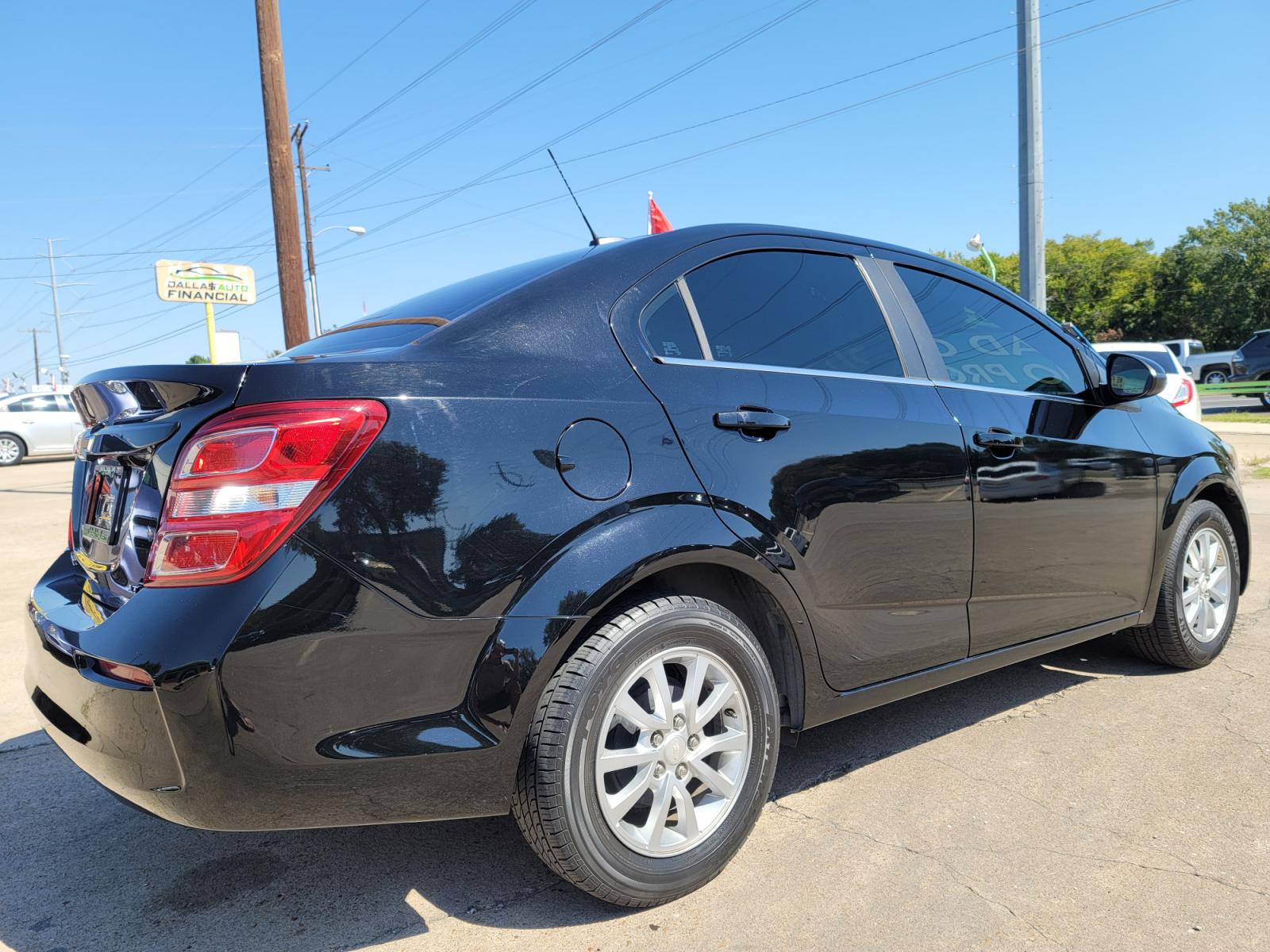 2017 BLACK Chevrolet Sonic LT (1G1JD5SH6H4) with an 1.8L L4 DOHC 24V engine, AUTO transmission, located at 2660 S.Garland Avenue, Garland, TX, 75041, (469) 298-3118, 32.885551, -96.655602 - Welcome to DallasAutos4Less, one of the Premier BUY HERE PAY HERE Dealers in the North Dallas Area. We specialize in financing to people with NO CREDIT or BAD CREDIT. We need proof of income, proof of residence, and a ID. Come buy your new car from us today!!rnrnThis is a very well cared for 2017 CH - Photo #3