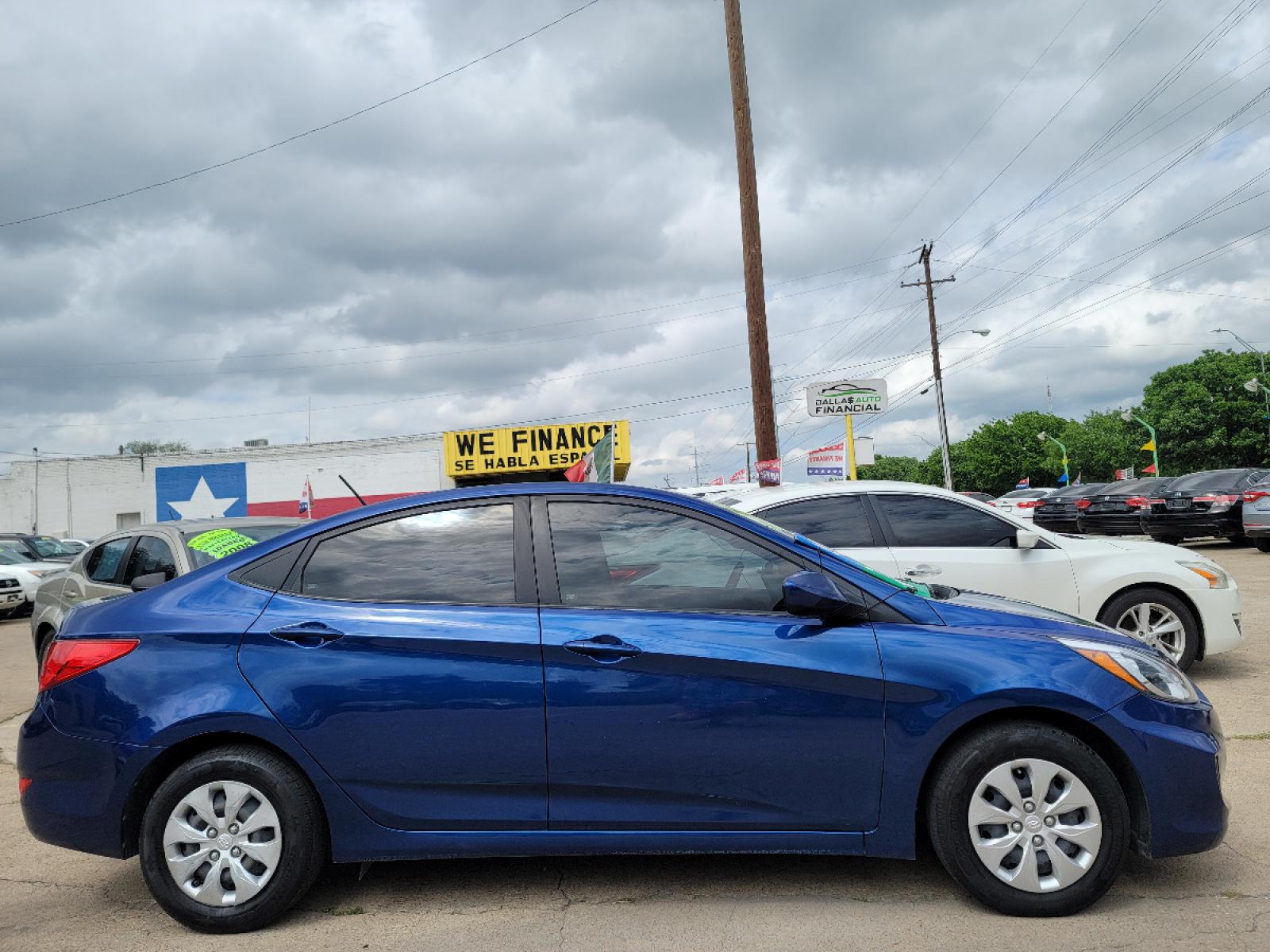 2017 BLUE Hyundai Accent SE (KMHCT4AE8HU) with an 1.6L L4 DOHC 16V engine, AUTO transmission, located at 2660 S.Garland Avenue, Garland, TX, 75041, (469) 298-3118, 32.885551, -96.655602 - Welcome to DallasAutos4Less, one of the Premier BUY HERE PAY HERE Dealers in the North Dallas Area. We specialize in financing to people with NO CREDIT or BAD CREDIT. We need proof of income, proof of residence, and a ID. Come buy your new car from us today!!rnrnThis is a Very clean 2017 HYUNDAI ACC - Photo #2