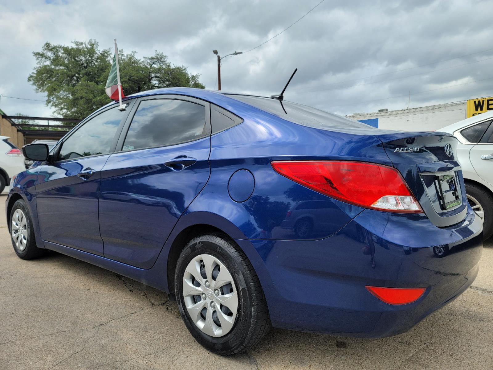 2017 BLUE Hyundai Accent SE (KMHCT4AE8HU) with an 1.6L L4 DOHC 16V engine, AUTO transmission, located at 2660 S.Garland Avenue, Garland, TX, 75041, (469) 298-3118, 32.885551, -96.655602 - Welcome to DallasAutos4Less, one of the Premier BUY HERE PAY HERE Dealers in the North Dallas Area. We specialize in financing to people with NO CREDIT or BAD CREDIT. We need proof of income, proof of residence, and a ID. Come buy your new car from us today!!rnrnThis is a Very clean 2017 HYUNDAI ACC - Photo #5
