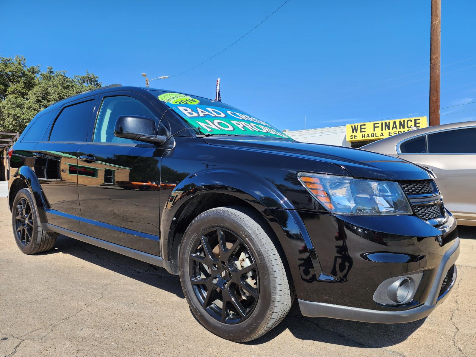 2019 BLACK /BLACK Dodge Journey SE (3C4PDCBB7KT) with an 2.4L L6 DOHC 16V engine, 4A transmission, located at 2660 S.Garland Avenue, Garland, TX, 75041, (469) 298-3118, 32.885551, -96.655602 - Welcome to DallasAutos4Less, one of the Premier BUY HERE PAY HERE Dealers in the North Dallas Area. We specialize in financing to people with NO CREDIT or BAD CREDIT. We need proof of income, proof of residence, and a ID. Come buy your new car from us today!!rnrnThis is a very clean 2019 DODGE JOURN - Photo #1
