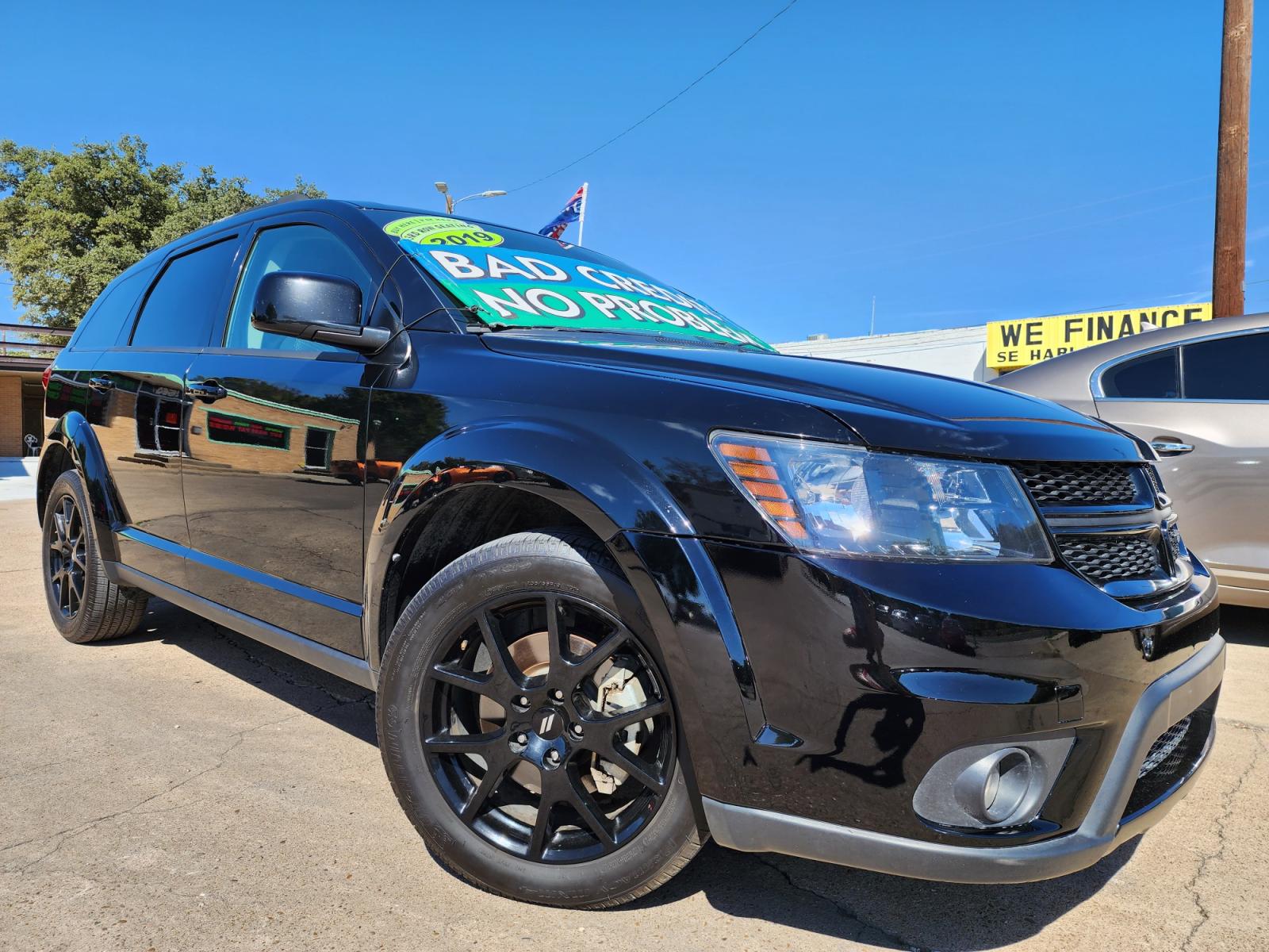2019 BLACK /BLACK Dodge Journey SE (3C4PDCBB7KT) with an 2.4L L6 DOHC 16V engine, 4A transmission, located at 2660 S.Garland Avenue, Garland, TX, 75041, (469) 298-3118, 32.885551, -96.655602 - Welcome to DallasAutos4Less, one of the Premier BUY HERE PAY HERE Dealers in the North Dallas Area. We specialize in financing to people with NO CREDIT or BAD CREDIT. We need proof of income, proof of residence, and a ID. Come buy your new car from us today!!rnrnThis is a very clean 2019 DODGE JOURN - Photo #0