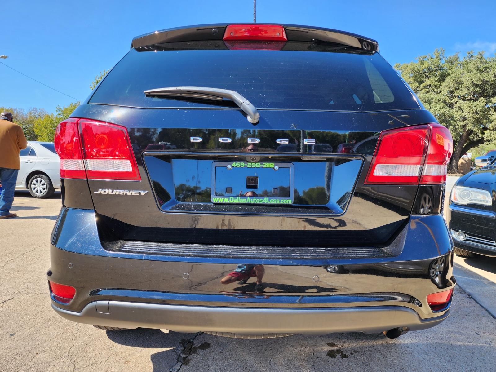 2019 BLACK /BLACK Dodge Journey SE (3C4PDCBB7KT) with an 2.4L L6 DOHC 16V engine, 4A transmission, located at 2660 S.Garland Avenue, Garland, TX, 75041, (469) 298-3118, 32.885551, -96.655602 - Welcome to DallasAutos4Less, one of the Premier BUY HERE PAY HERE Dealers in the North Dallas Area. We specialize in financing to people with NO CREDIT or BAD CREDIT. We need proof of income, proof of residence, and a ID. Come buy your new car from us today!!rnrnThis is a very clean 2019 DODGE JOURN - Photo #4