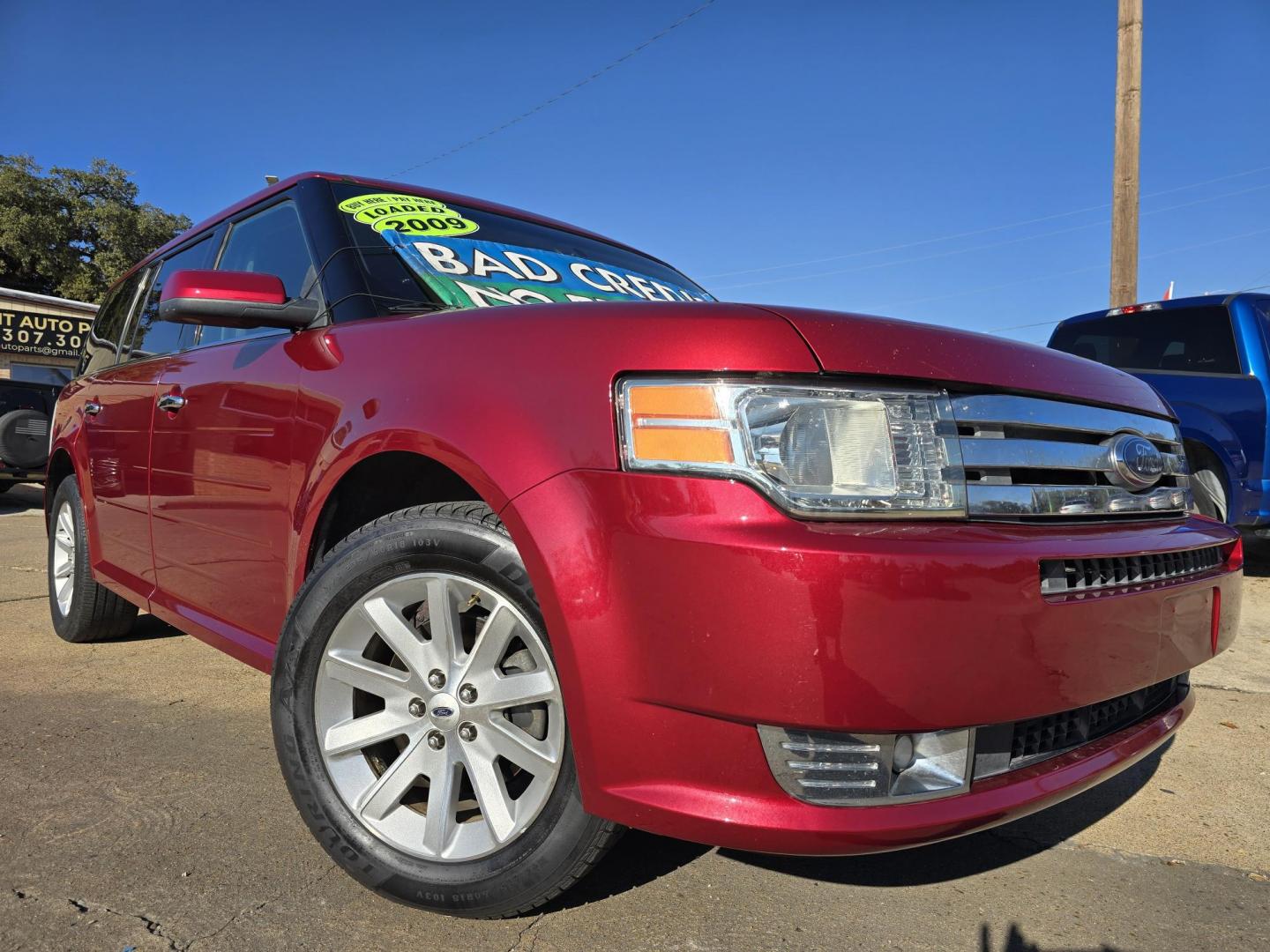 2009 RED Ford Flex SEL (2FMDK52C49B) with an 3.5L V6 DOHC 24V engine, 6-Speed Automatic transmission, located at 2660 S.Garland Avenue, Garland, TX, 75041, (469) 298-3118, 32.885551, -96.655602 - Photo#0