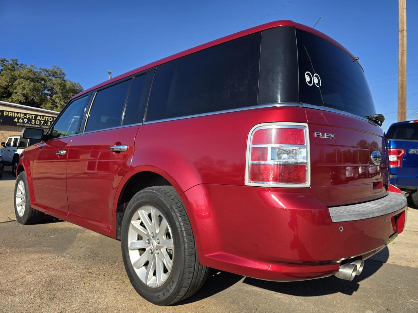 2009 RED Ford Flex SEL (2FMDK52C49B) with an 3.5L V6 DOHC 24V engine, 6-Speed Automatic transmission, located at 2660 S.Garland Avenue, Garland, TX, 75041, (469) 298-3118, 32.885551, -96.655602 - Photo#5