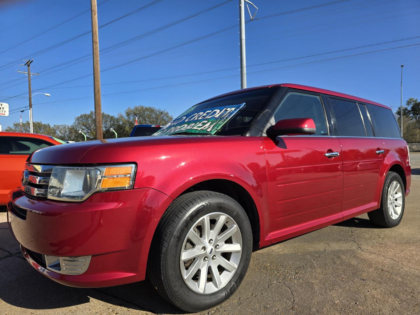 2009 RED Ford Flex SEL (2FMDK52C49B) with an 3.5L V6 DOHC 24V engine, 6-Speed Automatic transmission, located at 2660 S.Garland Avenue, Garland, TX, 75041, (469) 298-3118, 32.885551, -96.655602 - Photo#7