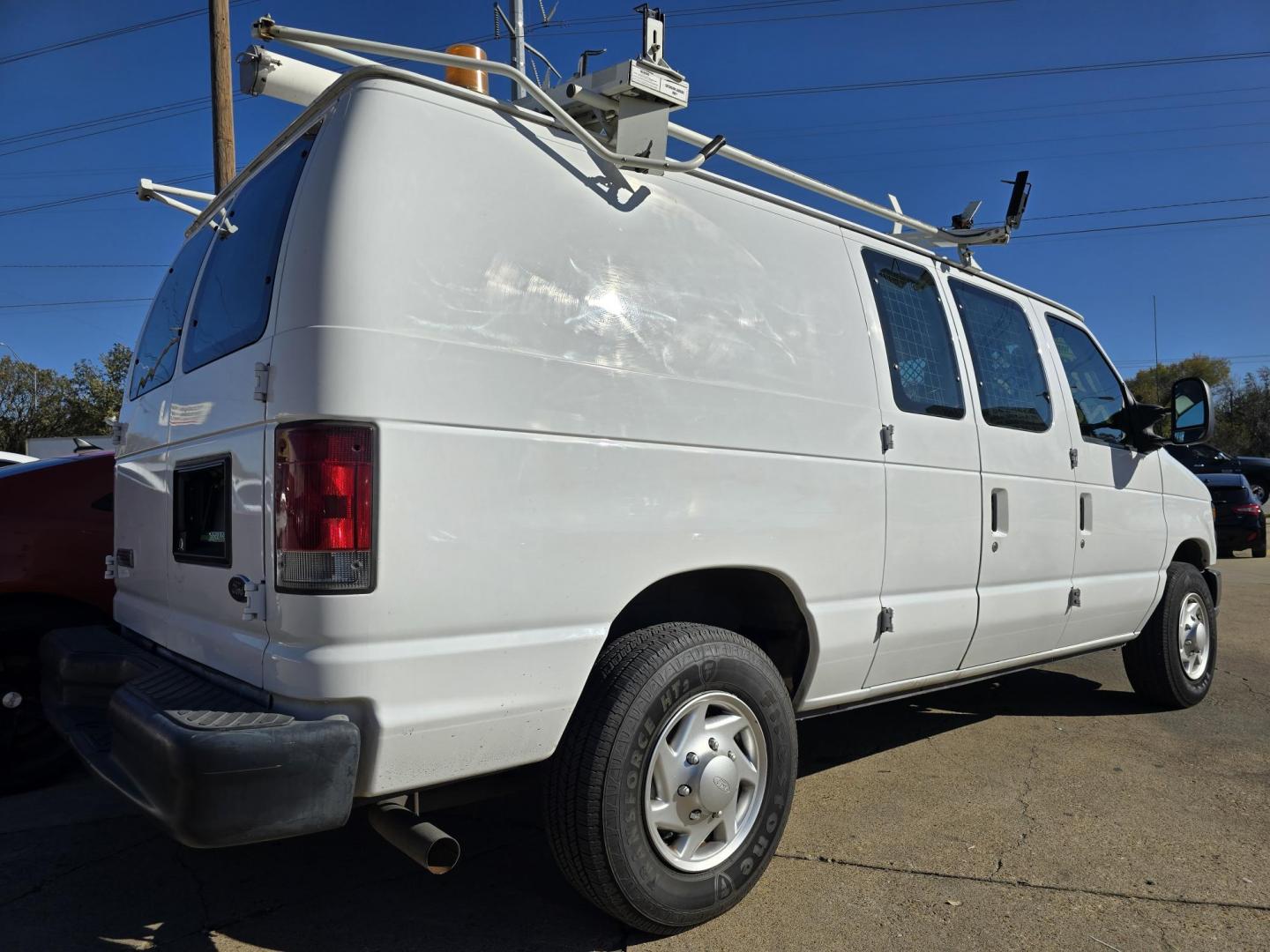 2010 Ford E-Series Van E-250 (1FTNE2EL9AD) with an 5.4L V8 SOHC 16V engine, 4-Speed Automatic transmission, located at 2660 S.Garland Avenue, Garland, TX, 75041, (469) 298-3118, 32.885551, -96.655602 - CNG FUEL - Photo#3