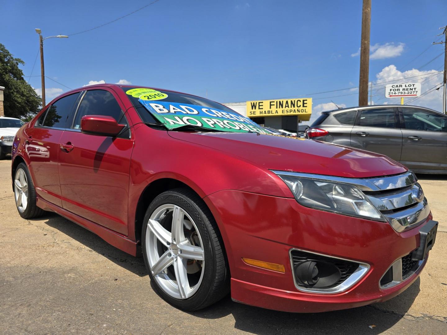 2010 RED Ford Fusion V6 Sport (3FAHP0KC4AR) with an 3.5L V6 DOHC 24V engine, AUTO transmission, located at 2660 S.Garland Avenue, Garland, TX, 75041, (469) 298-3118, 32.885551, -96.655602 - Photo#1