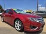 2010 RED Ford Fusion V6 Sport (3FAHP0KC4AR) with an 3.5L V6 DOHC 24V engine, AUTO transmission, located at 2660 S.Garland Avenue, Garland, TX, 75041, (469) 298-3118, 32.885551, -96.655602 - Photo#1