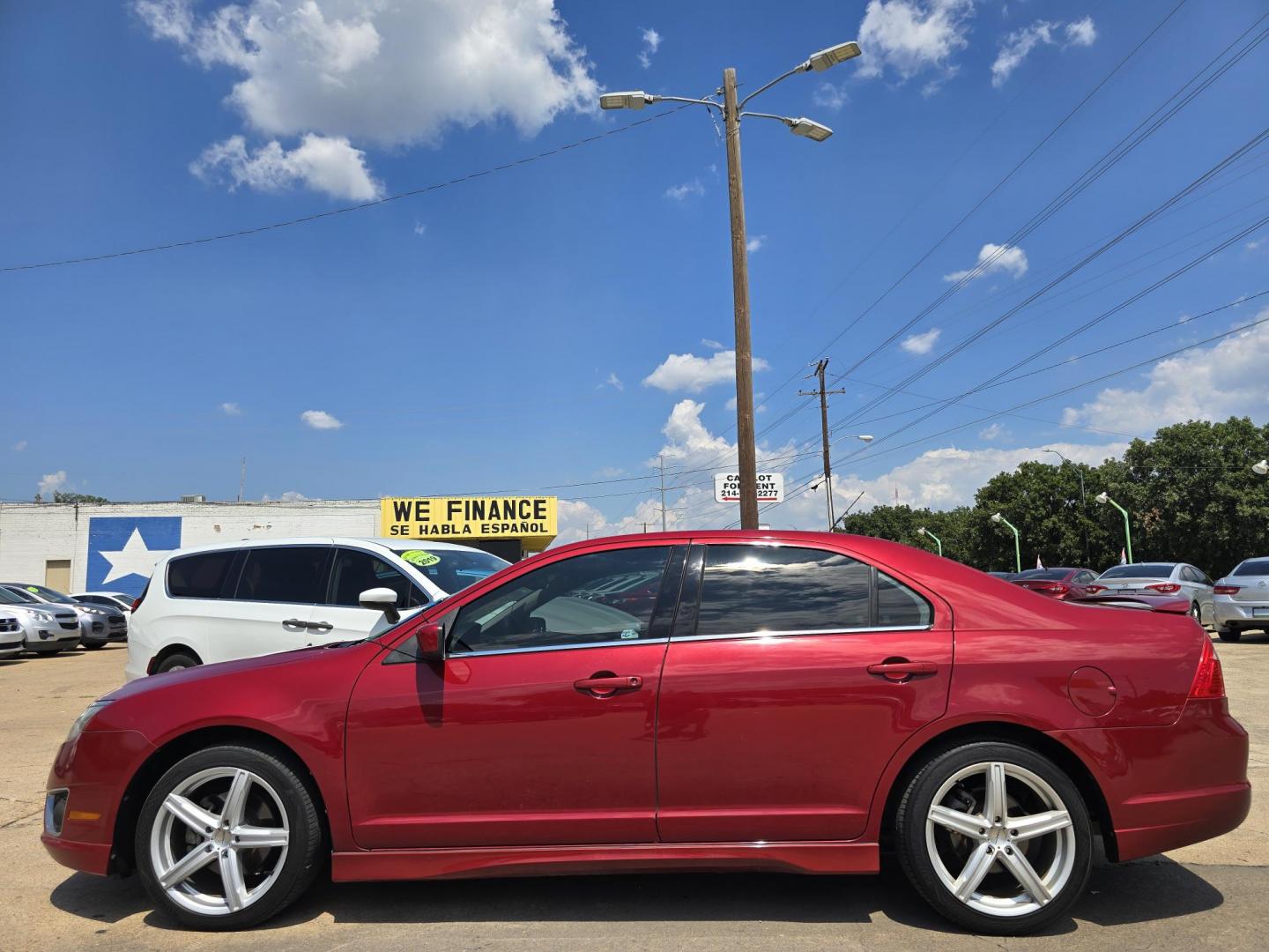 2010 RED Ford Fusion V6 Sport (3FAHP0KC4AR) with an 3.5L V6 DOHC 24V engine, AUTO transmission, located at 2660 S.Garland Avenue, Garland, TX, 75041, (469) 298-3118, 32.885551, -96.655602 - Photo#6