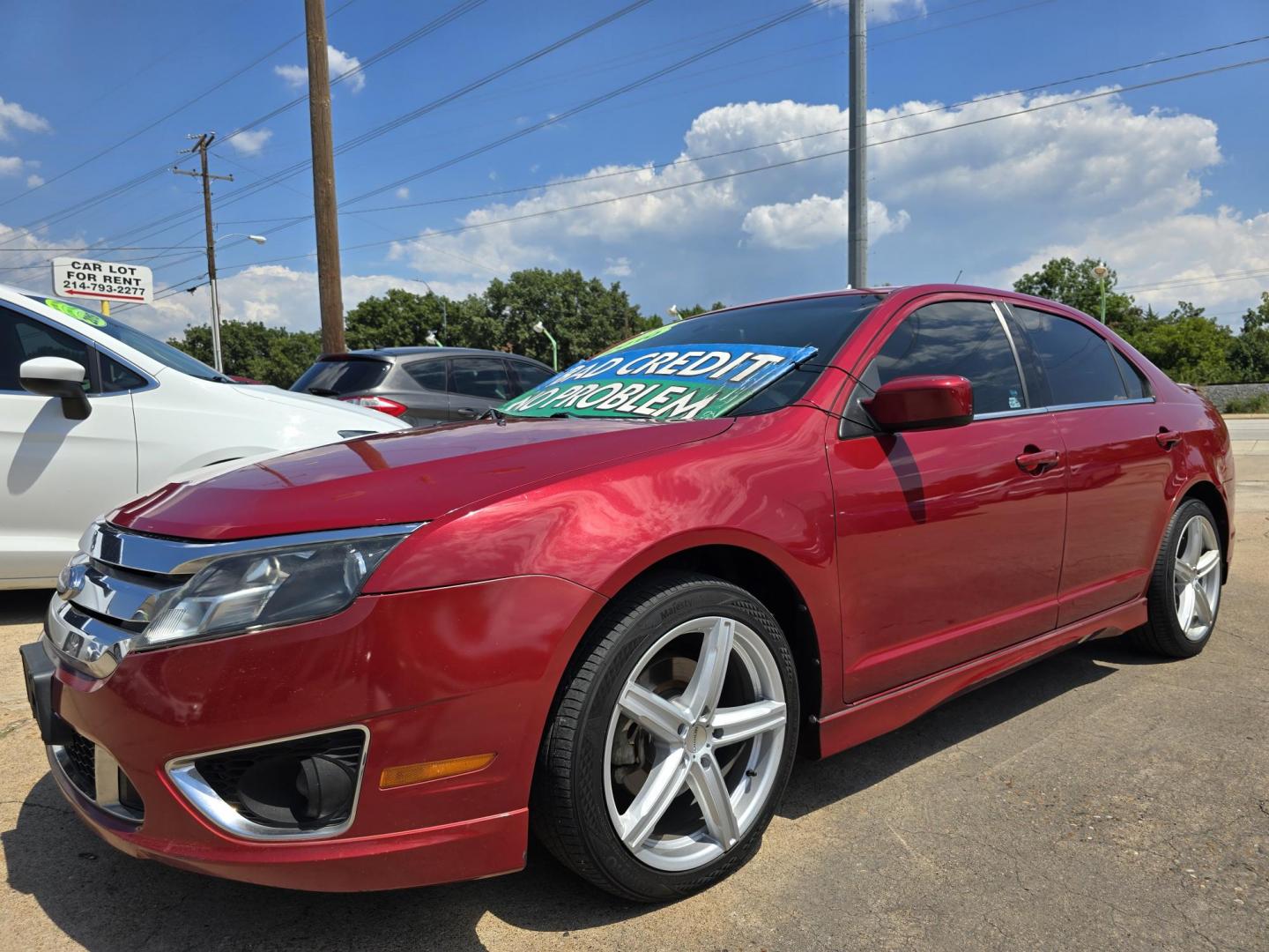 2010 RED Ford Fusion V6 Sport (3FAHP0KC4AR) with an 3.5L V6 DOHC 24V engine, AUTO transmission, located at 2660 S.Garland Avenue, Garland, TX, 75041, (469) 298-3118, 32.885551, -96.655602 - Photo#7
