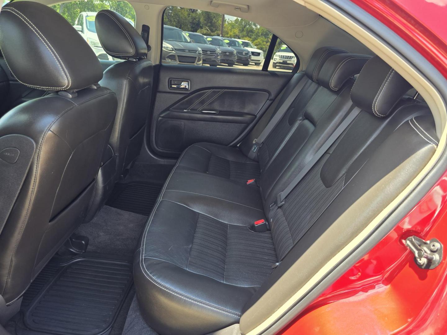 2010 RED Ford Fusion V6 Sport (3FAHP0KC4AR) with an 3.5L V6 DOHC 24V engine, AUTO transmission, located at 2660 S.Garland Avenue, Garland, TX, 75041, (469) 298-3118, 32.885551, -96.655602 - Photo#16