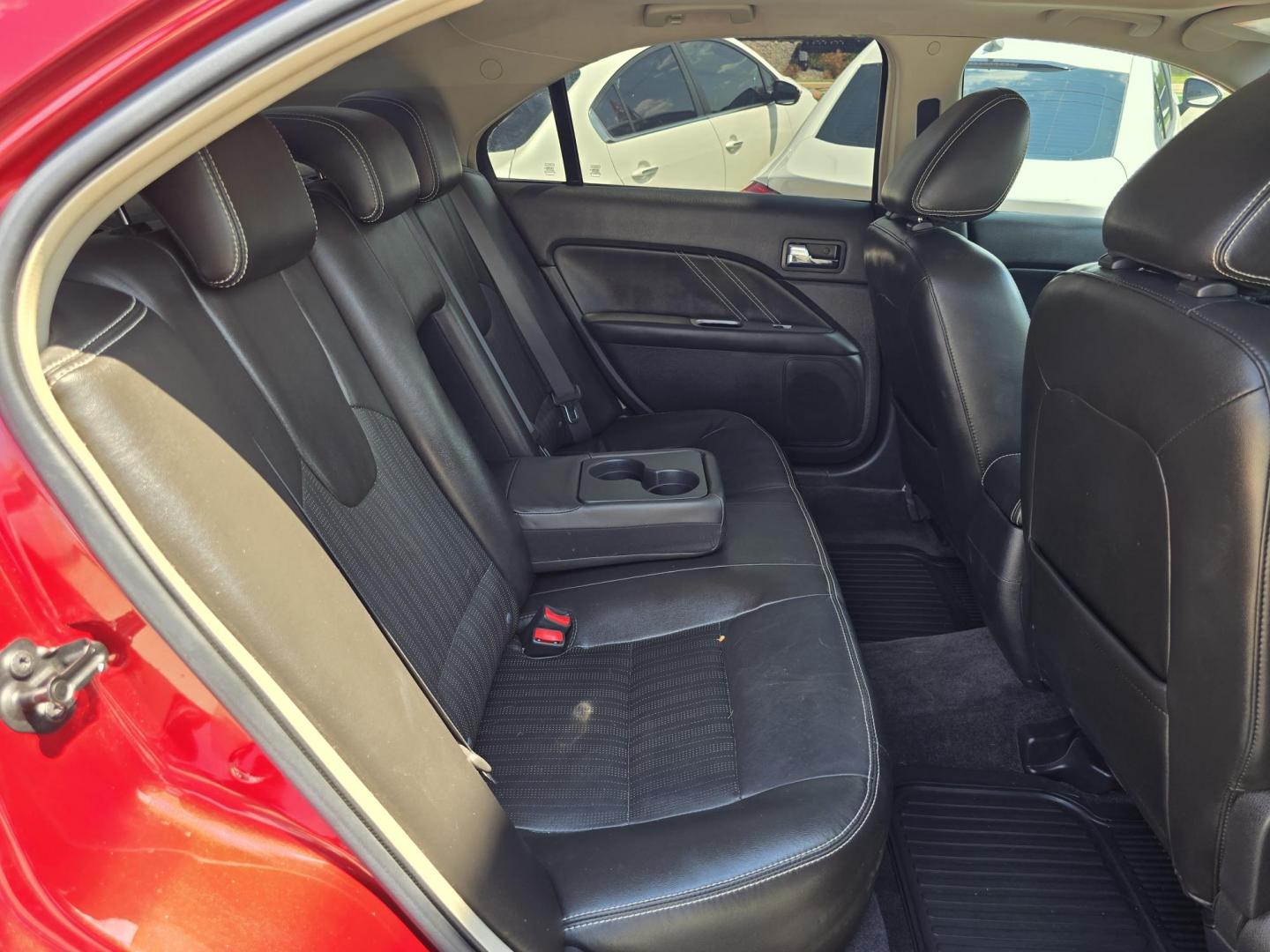 2010 RED Ford Fusion V6 Sport (3FAHP0KC4AR) with an 3.5L V6 DOHC 24V engine, AUTO transmission, located at 2660 S.Garland Avenue, Garland, TX, 75041, (469) 298-3118, 32.885551, -96.655602 - Photo#17