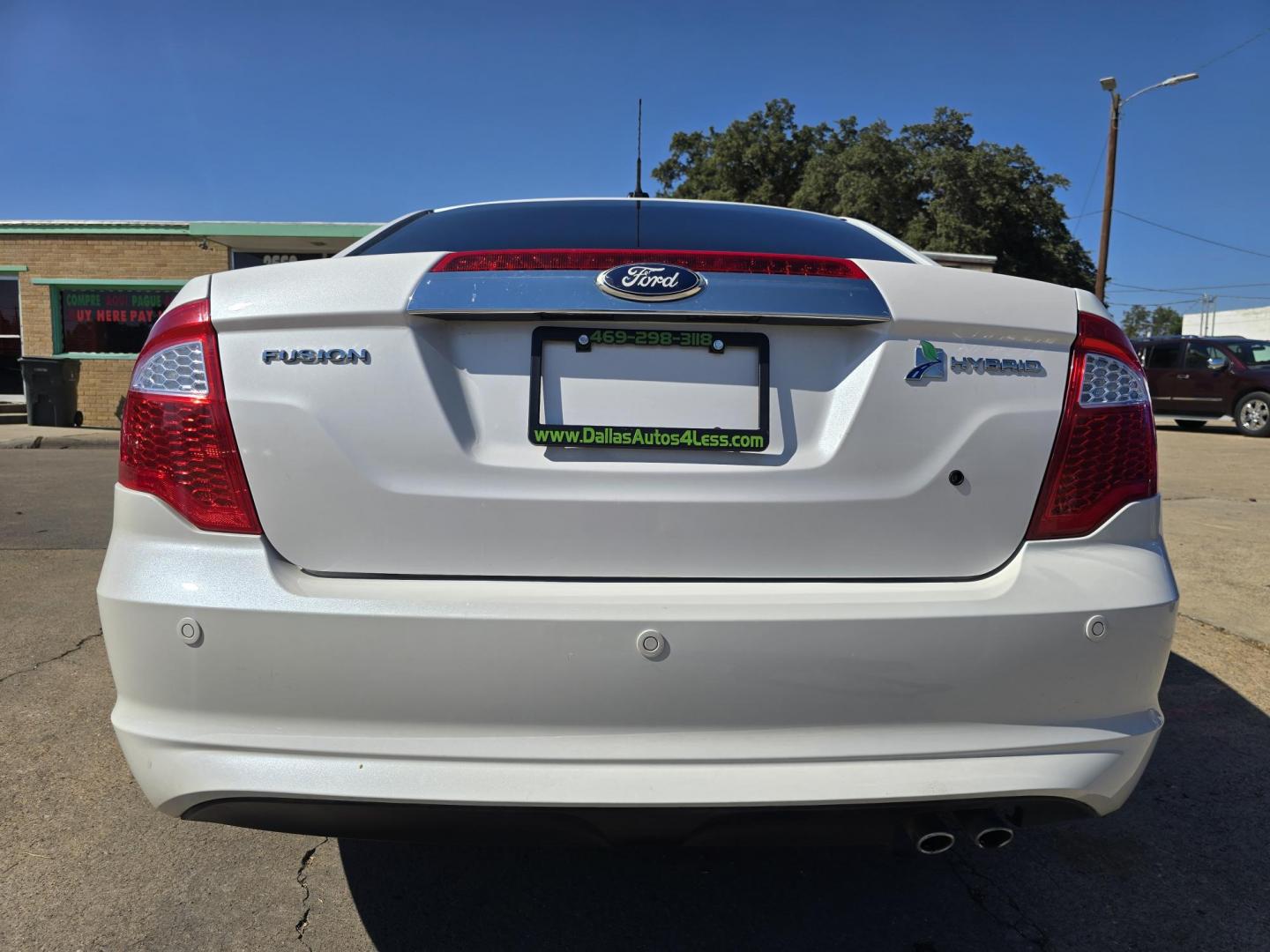 2011 DIAMOND WHITE Ford Fusion Hybrid Sedan (3FADP0L39BR) with an 2.5L L4 DOHC 16V HYBRID engine, AUTO transmission, located at 2660 S.Garland Avenue, Garland, TX, 75041, (469) 298-3118, 32.885551, -96.655602 - Photo#4