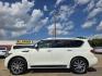2011 DIAMOND WHITE Infiniti QX56 (JN8AZ2NF5B9) with an 5.6L V8 DOHC 32V engine, 5-Speed Auto transmission, located at 2660 S.Garland Avenue, Garland, TX, 75041, (469) 298-3118, 32.885551, -96.655602 - Photo#6