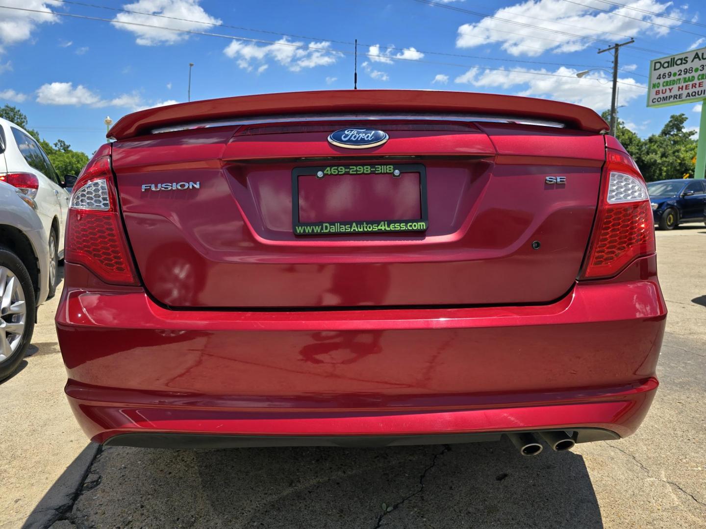 2012 RED Ford Fusion SE (3FAHP0HA8CR) with an 2.5L L4 DOHC 16V engine, AUTO transmission, located at 2660 S.Garland Avenue, Garland, TX, 75041, (469) 298-3118, 32.885551, -96.655602 - Photo#4
