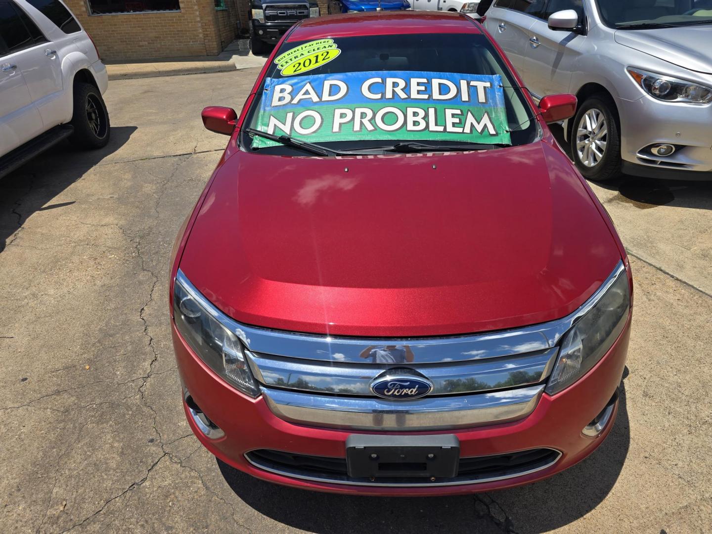 2012 RED Ford Fusion SE (3FAHP0HA8CR) with an 2.5L L4 DOHC 16V engine, AUTO transmission, located at 2660 S.Garland Avenue, Garland, TX, 75041, (469) 298-3118, 32.885551, -96.655602 - Photo#8