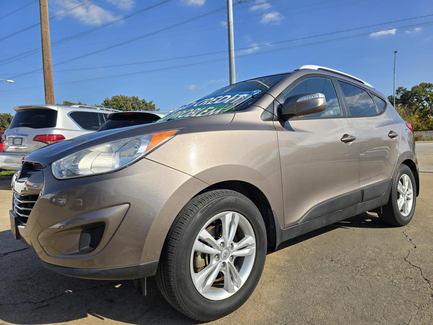 2012 Hyundai Tucson GLS (KM8JU3AC6CU) with an 2.4L L4 DOHC 16V engine, 6-Speed Automatic transmission, located at 2660 S.Garland Avenue, Garland, TX, 75041, (469) 298-3118, 32.885551, -96.655602 - Photo#7